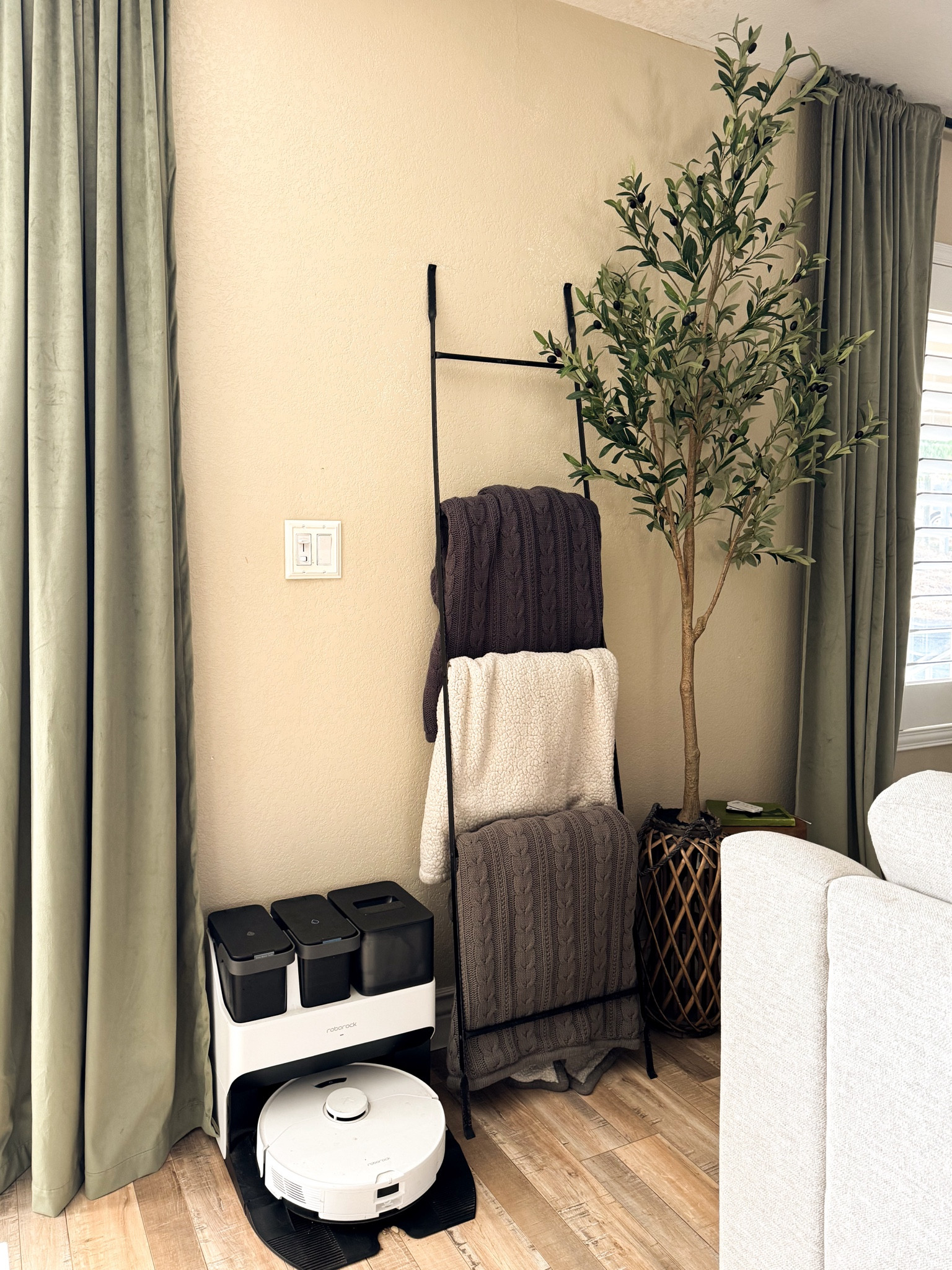 Robot vacuum mop, blanket ladder, faux olive tree, velvet curtains, living roomm

#LTKHome