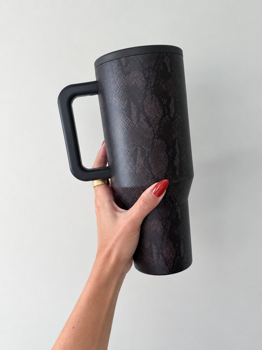My newest water bottle obsession. This snakeskin print HydroJug is such a fun neutral for fall, keeps my water cold for hours & makes hitting my water goal a little easier. Functional, cute & coming everywhere with me.

HydroJug tumbler - snakeskin water bottle - insulated tumbler - reusable water bottle - fall accessories - neutral aesthetic - everyday essentials - hydration essentials - travel tumbler - cup holder friendly

#LTKselfcare #LTKActive #LTKfitnessgoals