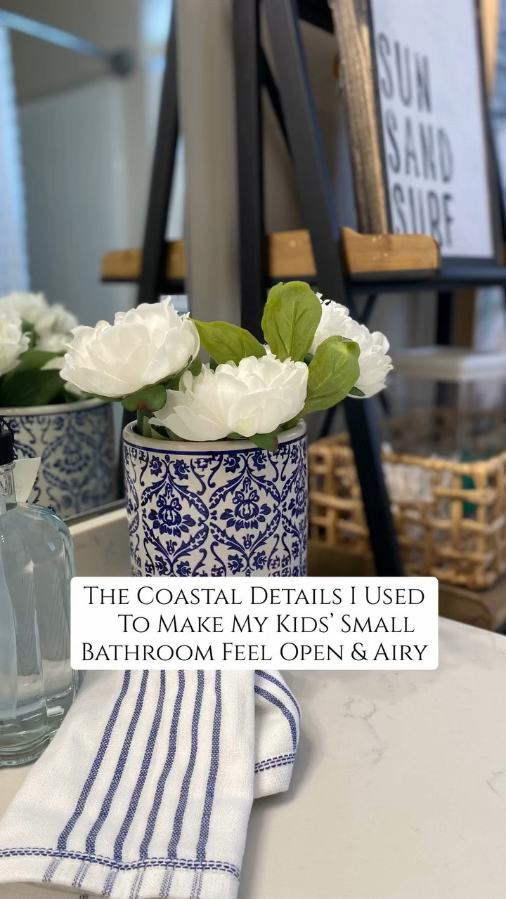 A few years ago, we did some cosmetic updates to our kids’ bathroom. It’s shared by my two sons and my daughter so we didn’t want anything too gender-specific. And, I wanted it to feel clean, open and airy. I chose the paint color Sculptor’s Clay because it looked like beach sand. And, I went with matte black hardware to add visual depth and contrast against the creamy white vanity. Then I layered in some open wood shelving for storage, some natural wood decor, and touches of navy to add that classic coastal feel. Last, I added an oversized canvas of a beautiful ocean scene. I think it came out perfect and the whole refresh was under $500! 🌊💙🤍

Comment SHOP for links to all the products I used to create this highly functional, but beautiful bathroom refresh. 

#bathroom #reels #homedecor #bathroomdecor #coastaldecor