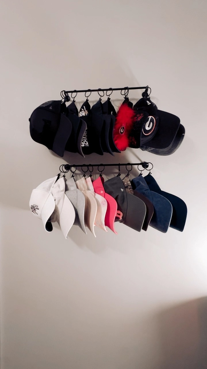 Baseball cap / trucker hat storage that displays them and makes them easy to get to! Just has little clips on each ring. Can clip by sides, back, or bill

#LTKVideo #LTKfindsunder50 #LTKhome