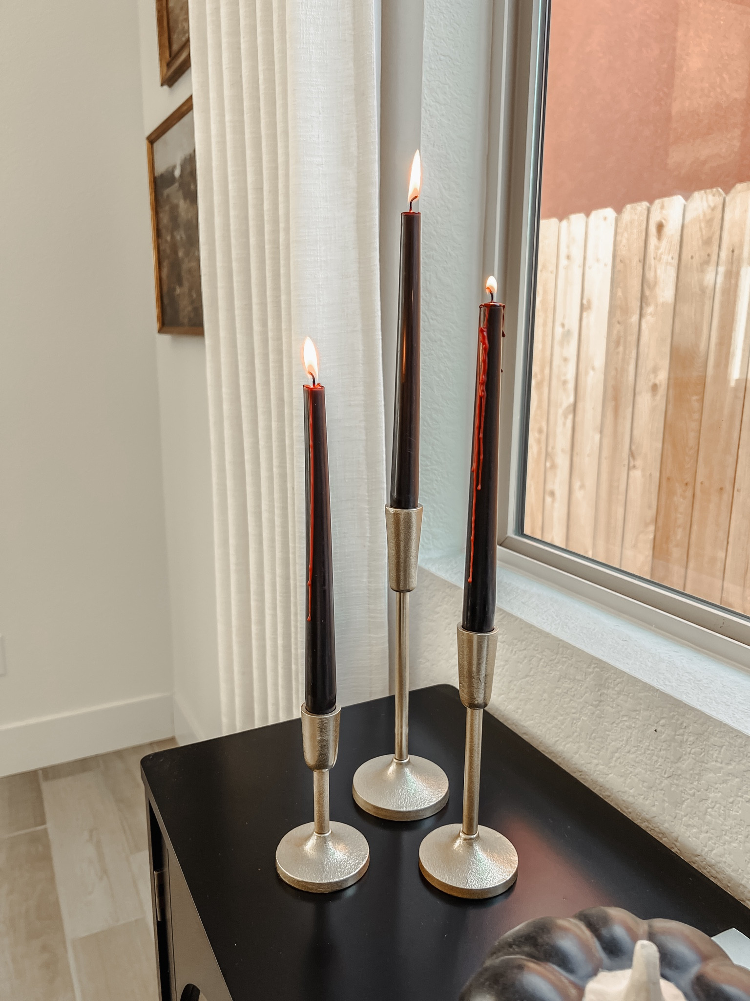 Bleeding taper candles 🕯️🩸 Perfect Halloween decor for your home 

#LTKHalloween #LTKSeasonal #LTKHome