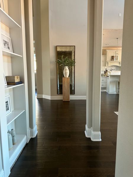 A hallway moment. The pedestal and similar vase are linked here along with my best selling Amazon stems. My mirror is restoration hardware I have linked a similar one here. 

#LTKFind #LTKhome #LTKstyletip