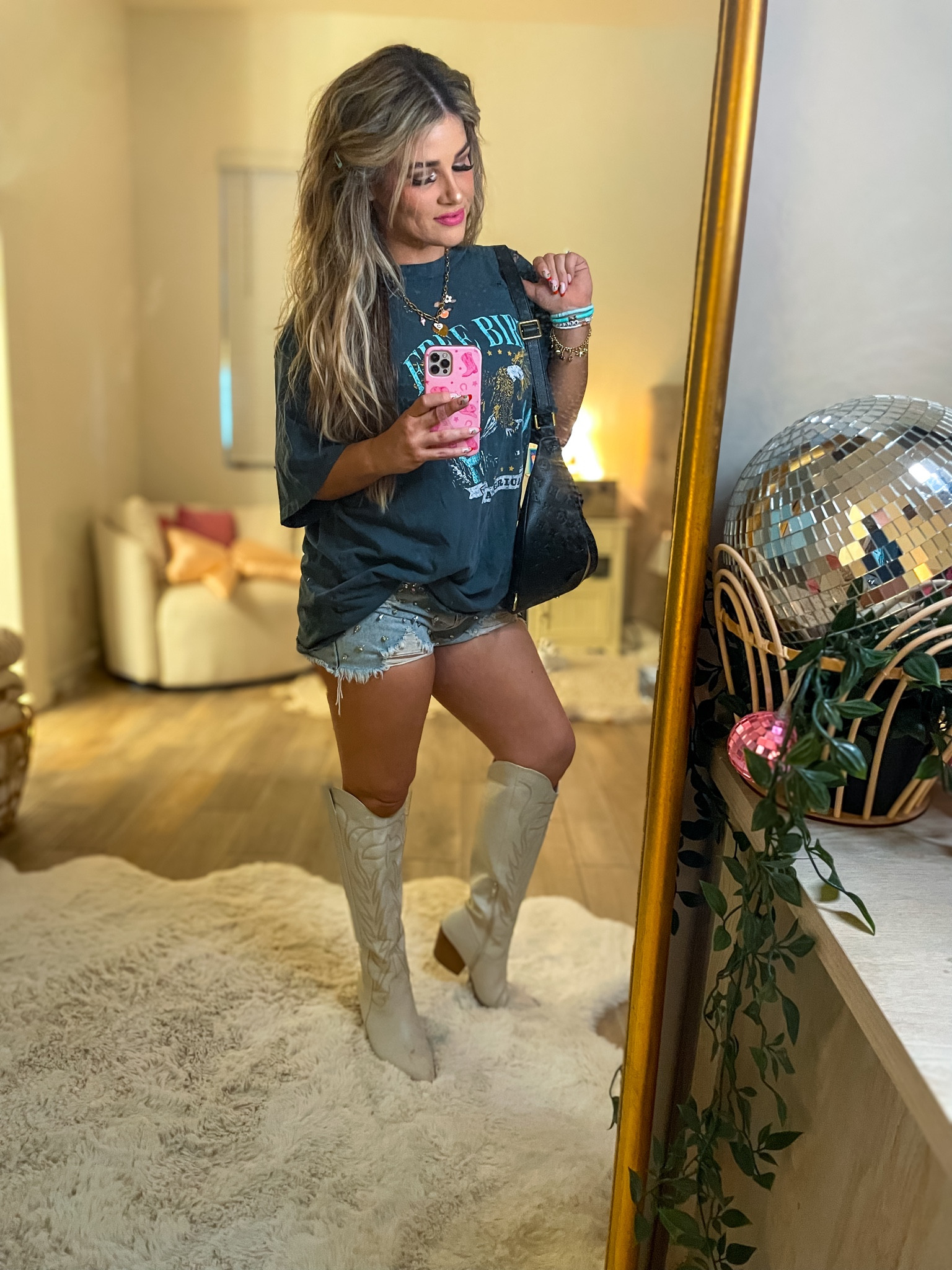 Outfit check for Girls Night Out! 🩵🤠🪩

#SummerOutfit #OversizedTee #Distressed #ConcertOutfit #WhiteBoots #ElectricPicks 

#LTKStyleTip #LTKFindsUnder50 #LTKShoeCrush