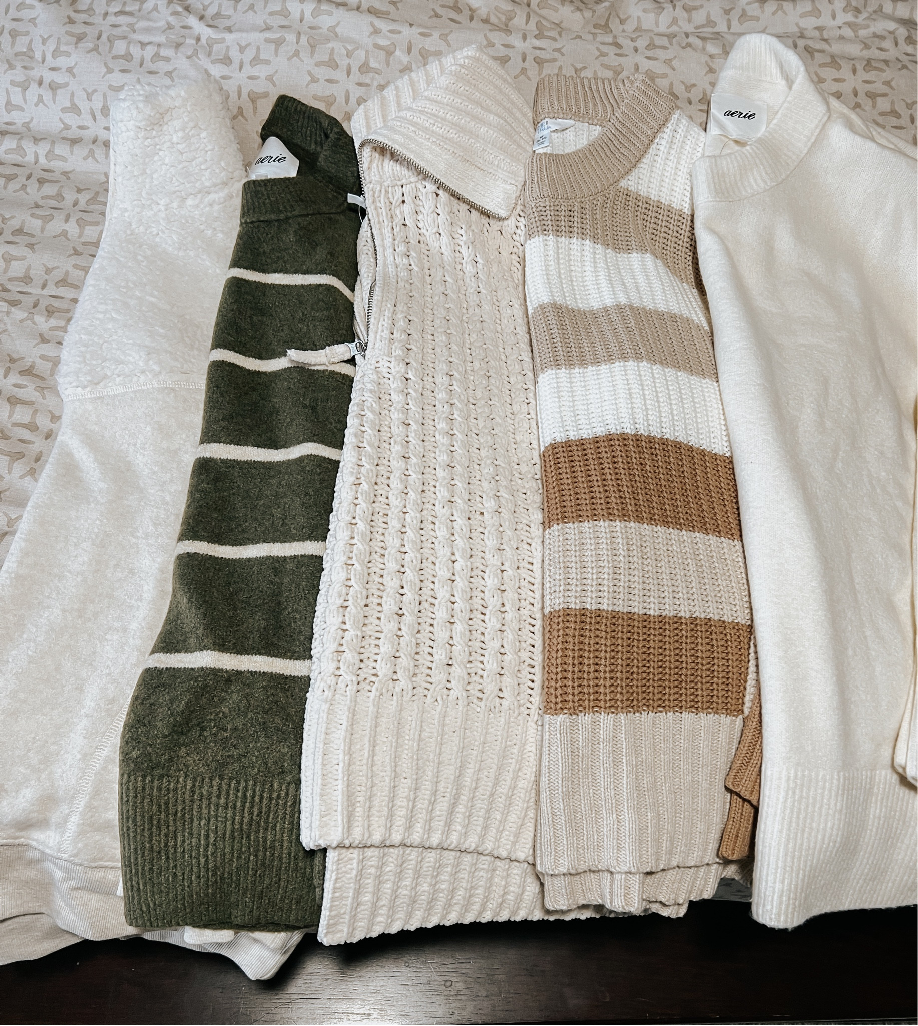 Aerie got the jackpot with these sweaters! They are so incredibly soft and comfortable and will be worn on repeat this fall/winter! All BUMP FRIENDLY TOO!!

Aerie unreal sweater (green stripe/toasted coconut) - small 
Quarter zip sweatshirt - small 
Cable knot sweater - small could have sided up to medium
Beige stripe sweater - medium could have sized up to large 

Aerie finds, Walmart finds, cozy sweaters, fall sweaters, winter sweaters, bump friendly fashion finds, Walmart fashion finds 

#LTKbump #LTKfindsunder50 #LTKSeasonal