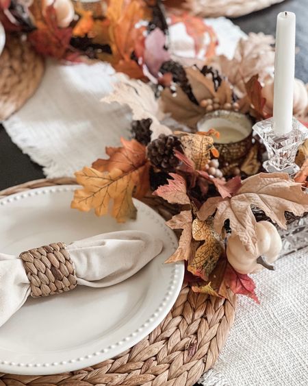 A simple #LTKFall decor idea for your #LTKThanksgiving tablescape! My “hack” is to make a figure eight (♾️) design with the garland and connect the ends underneath with a gold paper clip. Place your candlesticks in the loops and voila! An easy, festive dining space. 🍂🍁

#LTKSeasonal #LTKhome