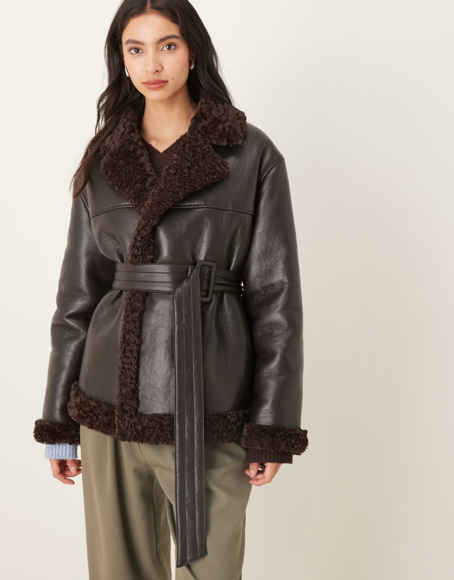 Gina Tricot short teddy PU belted jacket in black with brown collar trims | ASOS (Global)
