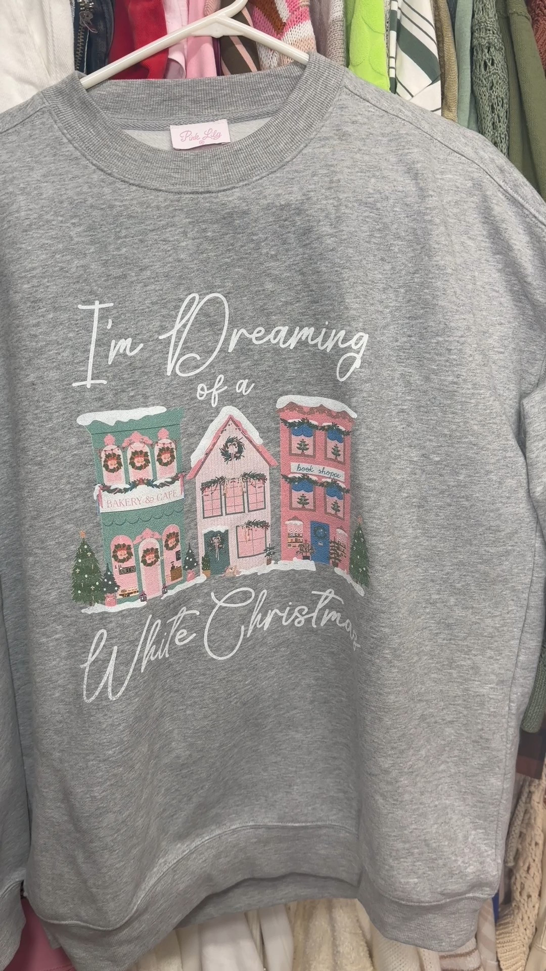 I love this vintage Christmas Village graphic sweatshirt! I really am dreaming of a white Christmas 🎄🤍

#LTKGiftGuide #LTKHoliday #LTKCyberWeek