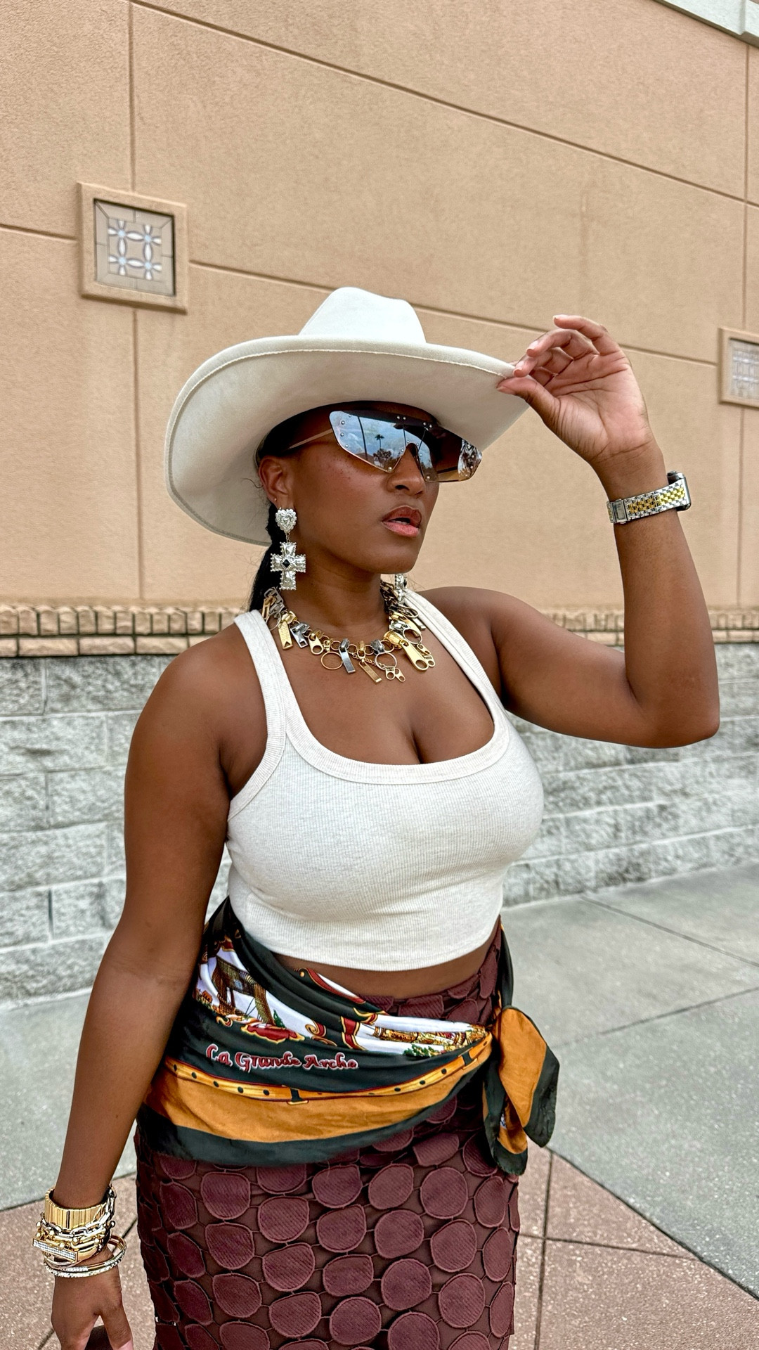 Style Tip Tuesday ✨ When styling feels tricky, start with one exciting piece and build around it. This skirt is giving all the shape + texture, so I kept the rest simple with a nod to fall. 

🍂 For my Florida girls (or anyone still in hot weather), try adding fall-inspired colors + boots without the heavy layers. Easy way to transition your wardrobe while staying cool. 

👢 Would you rock this for early fall?

#falloutfit #fallfashiontrends #fallinflorida #floridafall #summertofall