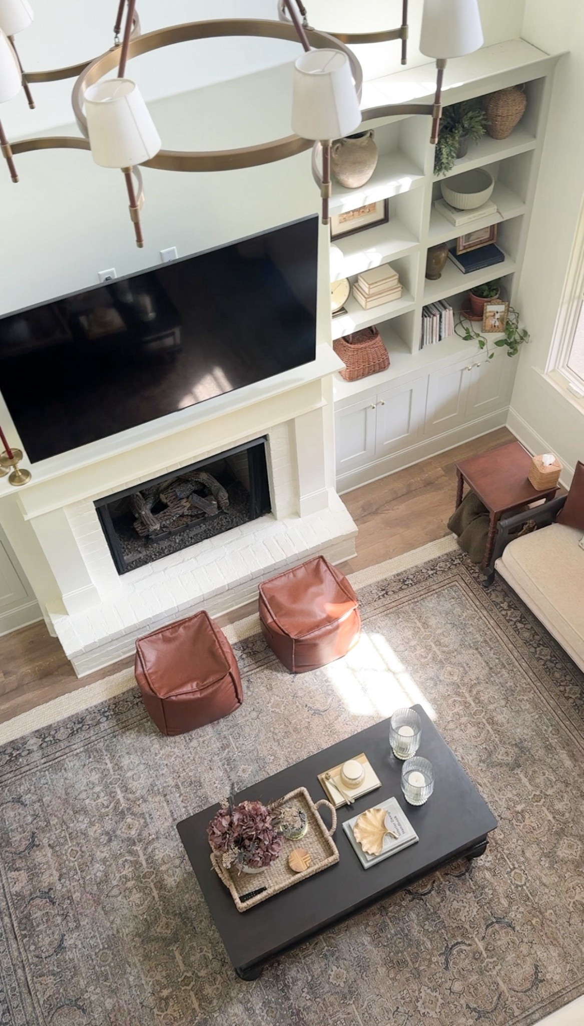 ☀️ Sunny living room views from above! I love how this angle from the loft shows off our living room layout and lets you see more of the rug’s pattern. This area rug has been such a versatile piece — the colors work with almost anything and the style blends so easily into different looks. Definitely one of those finds that just works wherever you put it! ✨

#LTKHome