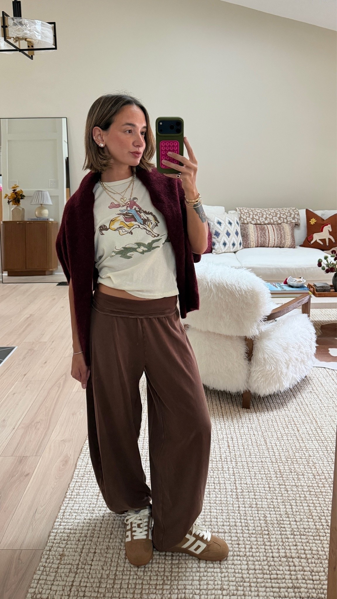 Size 0 in tee and XS bottoms. Small in the sweater!