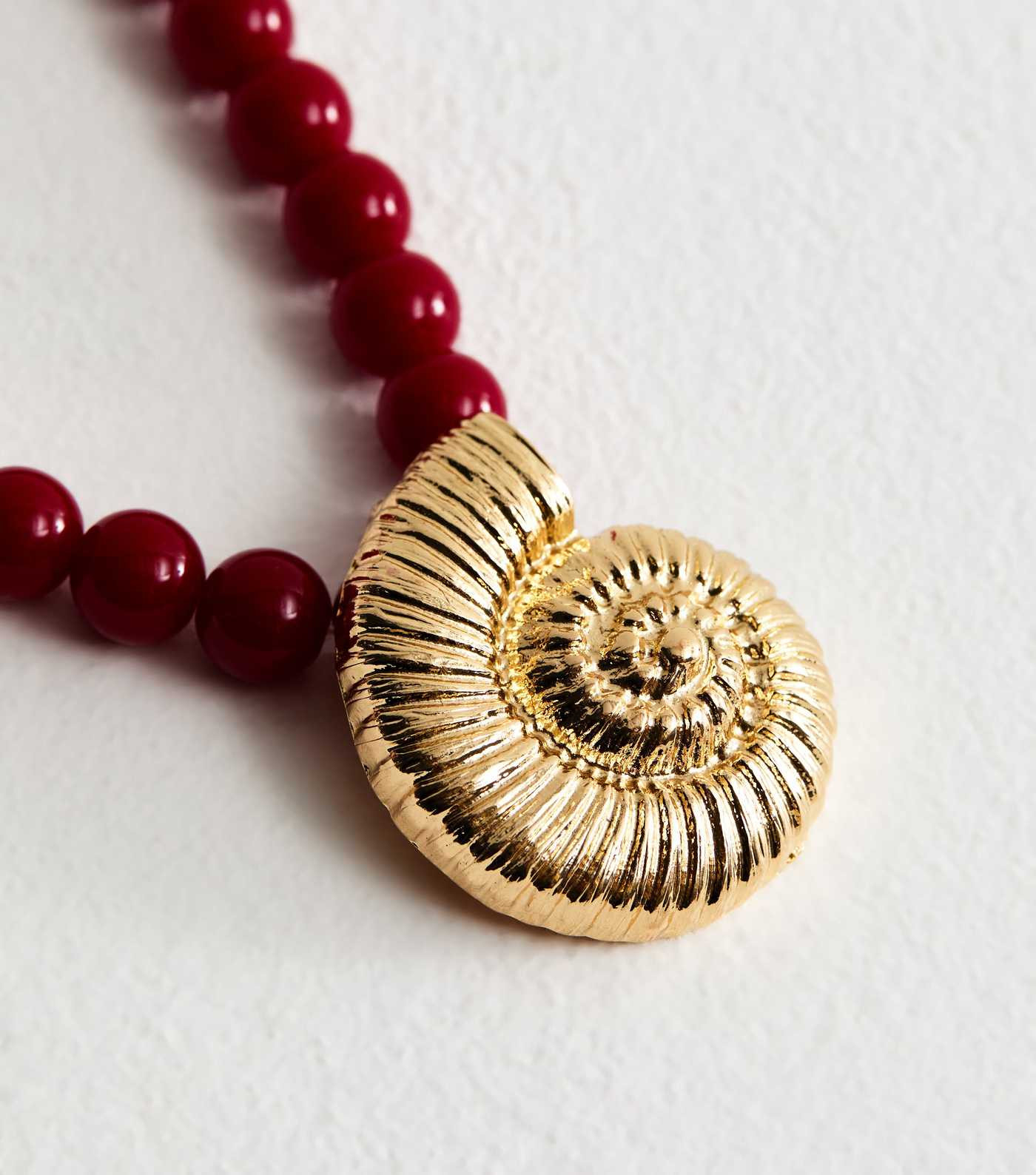 Red Beaded Swirly Shell Pendant Necklace | New Look | New Look (UK)