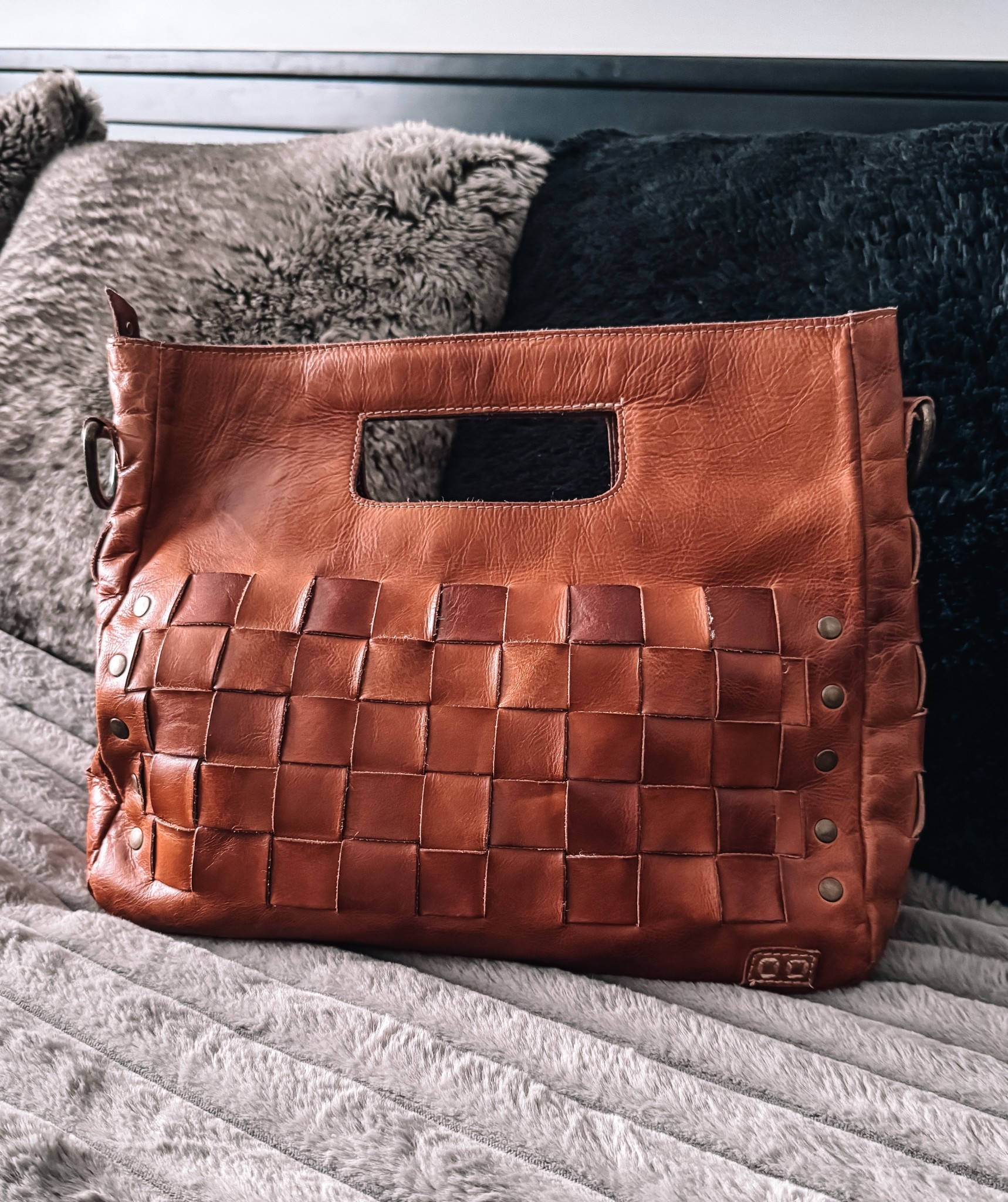 My favorite everyday bag: the Bed|Stu Keiki.
This handcrafted leather beauty is the perfect blend of rugged, refined, and effortlessly cool. Made from premium genuine leather, the Keiki features a unique woven panel, clean structured lines, and hand-finished details that make every bag one-of-a-kind. The built-in handle cutout adds a chic, minimalist touch while the spacious interior makes it practical for daily wear. I love the rich, warm tone of this leather—it pairs perfectly with fall outfits, neutral basics, and year-round capsule wardrobe pieces.

Whether you’re styling it with denim, cozy knits, or your go-to elevated casual looks, this bag is the definition of timeless craftsmanship and slow-fashion style. A forever favorite.

Bed Stu • Bed Stu Keiki • Leather Bag Style • Genuine Leather Bag • Handcrafted Leather • Capsule Wardrobe Favorites • Neutral Outfit Inspo • Everyday Bag • Classic Style • Fall Fashion Finds • Elevated Casual • Minimalist Style • Woven Leather Bag • Timeless Style • Fashion Essentials • Neutral Style • Capsule Wardrobe 

#LTKootd #LTKGiftGuide #LTKOver40