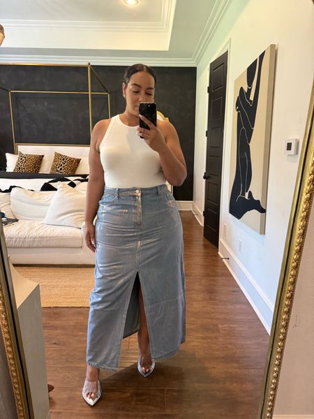 This metallic denim skirt from boohoo is so cute for summer nights! Wearing a 18 and it has some stretch 

#LTKPlusSize #LTKMidsize #LTKFindsUnder50