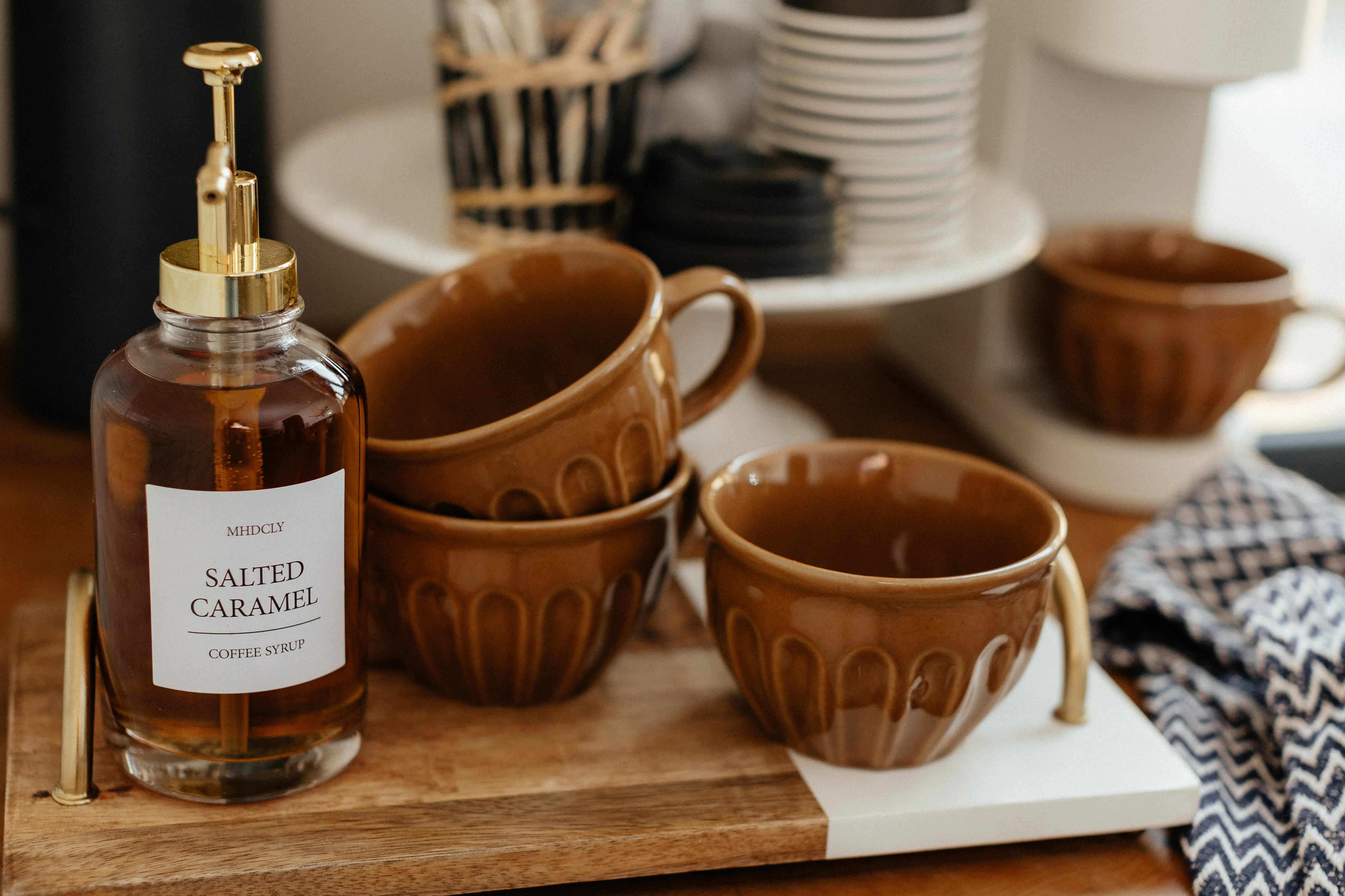 Cozy fall coffee station styling.

The syrup pumps take it to the next level,don't you think? 

 #LTKHome #LTKFindsUnder50 #LTKautumn