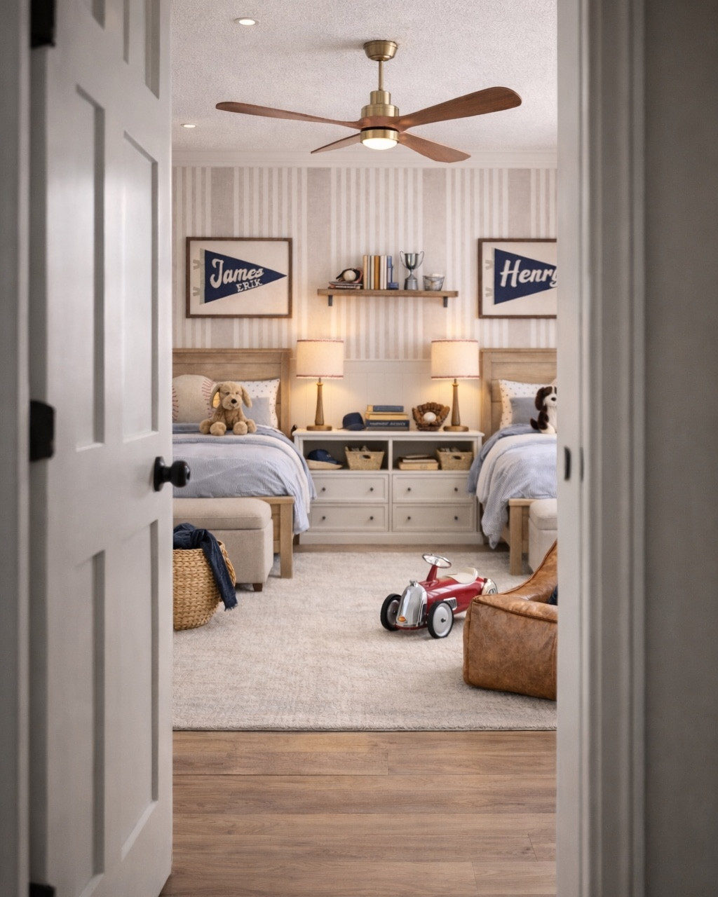 A classic baseball themed boys bedroom that feels timeless, cozy, and tailored 🤍 I love designing spaces for brothers that feel cohesive but still special for each child. Two twin beds also make for the perfect sleepover setup.

In this room we layered soft striped wallpaper, warm wood beds, baseball-inspired pillows, and vintage pennant artwork to create a space that feels playful but still elevated. The built-in nightstand storage between the beds keeps everything functional while the matching lamps, neutral benches, and woven baskets add warmth and texture.

It’s the perfect mix of preppy, classic, and traditional kids bedroom design that will grow beautifully with them over the years.

Keywords: shared boys bedroom, boys bedroom for brothers, twin beds boys room, classic boys bedroom decor, striped wallpaper bedroom, wood twin beds, baseball bedroom decor, vintage pennant wall art, traditional kids bedroom design, preppy boys room ideas, neutral boys bedroom, modern classic kids room, boys bedroom with twin beds, kids room storage ideas, built in nightstand between beds, timeless boys bedroom style, cozy kids bedroom design.

#LTKKids #LTKBaby #LTKHome