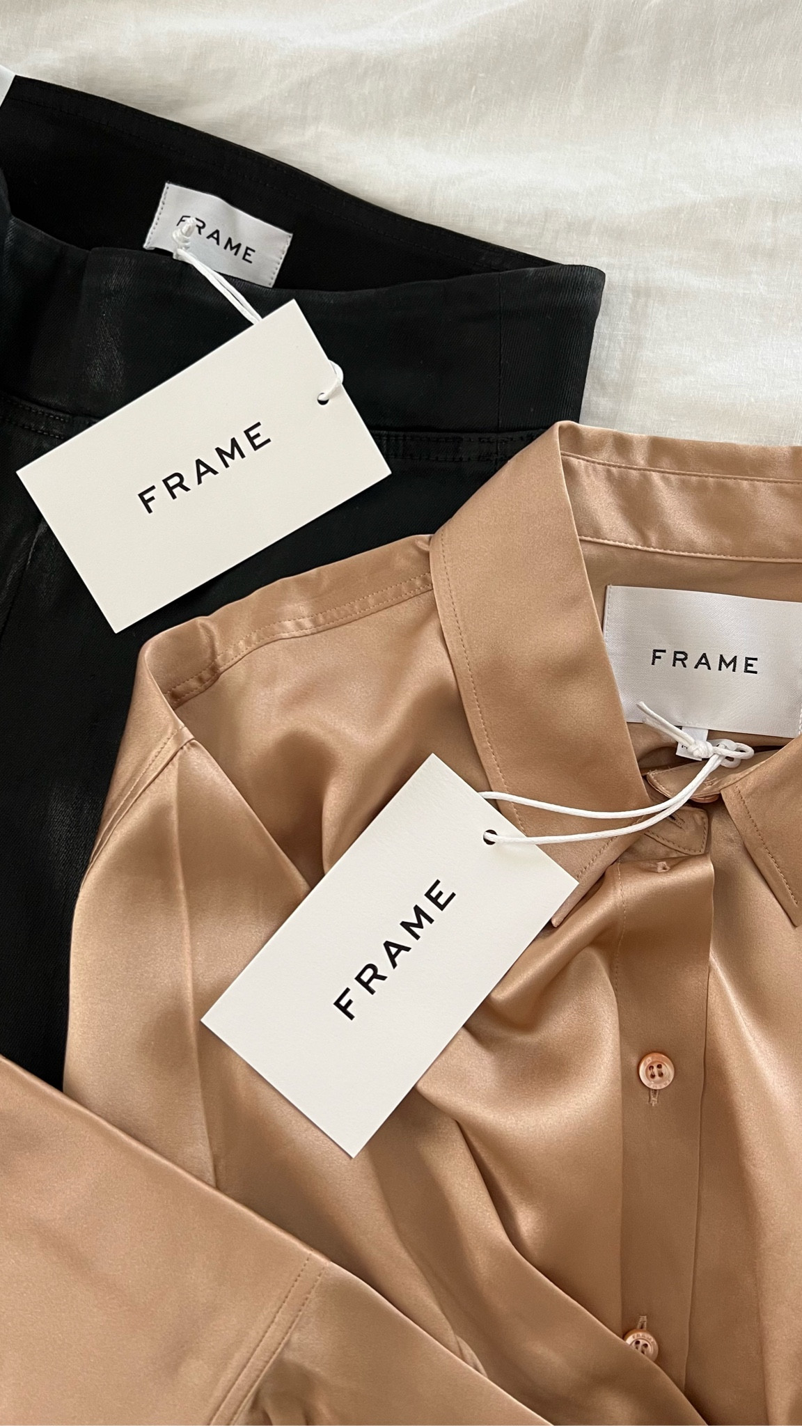 Silk button down shirt, coated black flare leggings. Frame denim 

#LTKstyletip #LTKSeasonal #LTKunder100