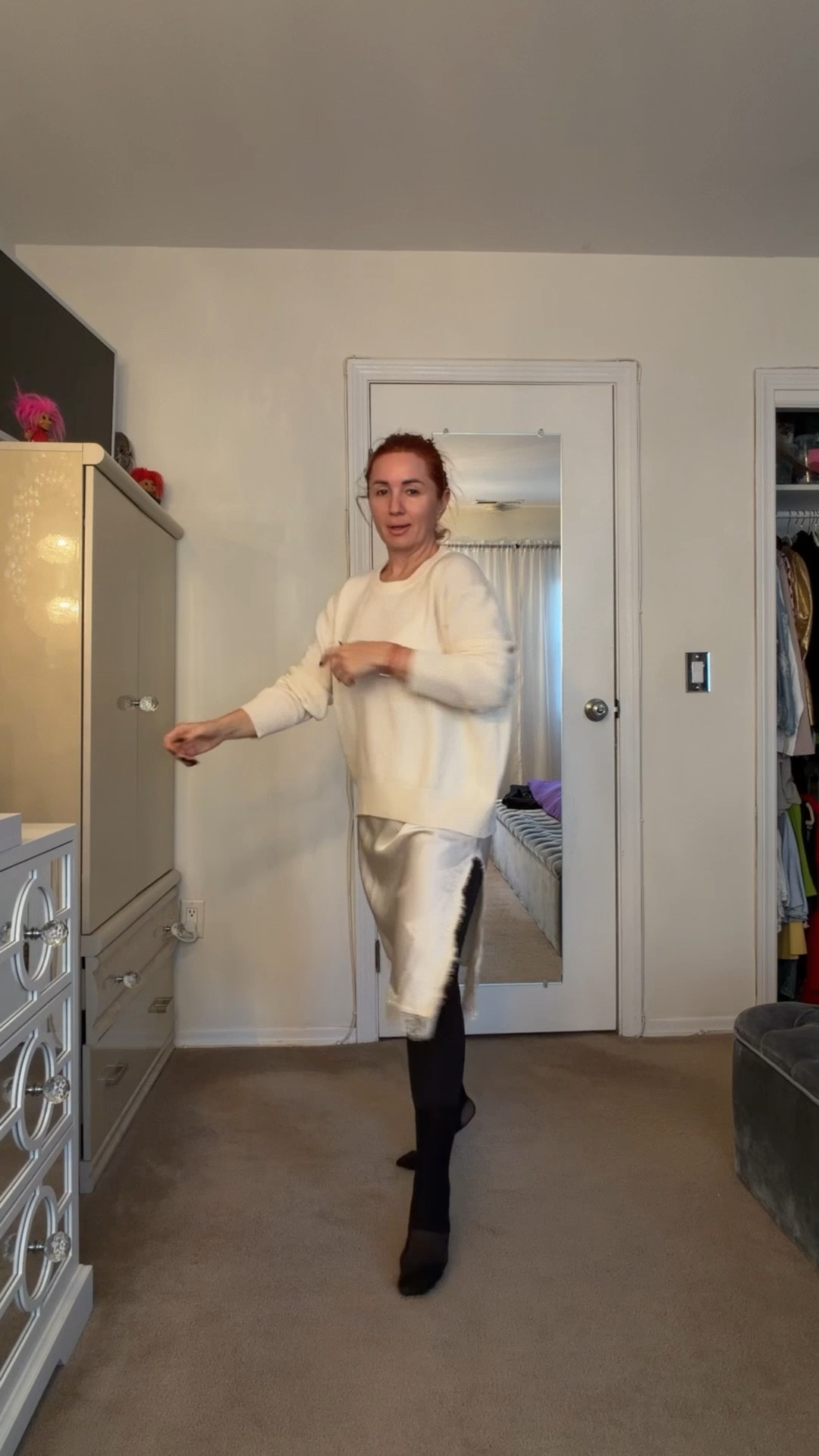 A quick get-ready moment, but with a touch of quiet luxury.
A silk slip as the soft base, a white cashmere layer for warmth, and clean lines that make the whole look effortless.

Sometimes the chicest outfits come from just three colors —
black boots, minimal accessories, and a grey coat that ties everything together.

Timeless, simple, feminine.
An everyday elegance you can actually wear.

silk dress, cashmere sweater, chic outfit, minimal style, winter look, grey coat, black boots, effortless chic, timeless wardrobe, neutral tones, classic style

#LTKOver40 #LTKdayinmylife #LTKootd