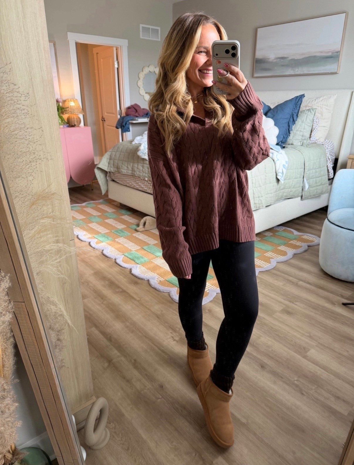 Effortless outfits are my favorite kind.
Soft cable-knit sweater + leggings + cozy boots = an outfit you can throw on and feel good in all day.
Wearing this combo on repeat