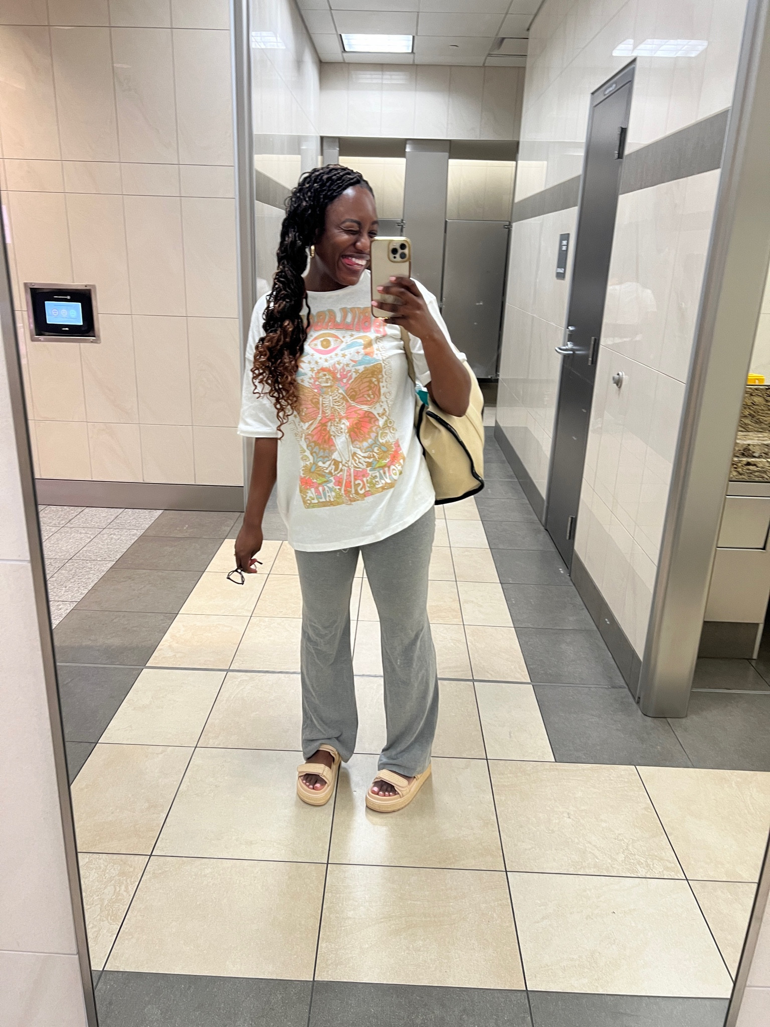 My airport look for a long flight! Cozy pants, oversized graphic tee, and flat form sandals are the way to go 

#LTKxNSale #LTKStyleTip #LTKTravel