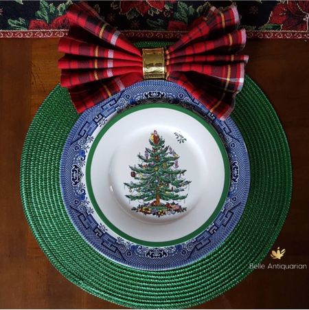 This place setting is created by layering a Spode Christmas tree salad plate on top of a Blue Willow dinner plate. 

#LTKhome #LTKsalealert #LTKHoliday