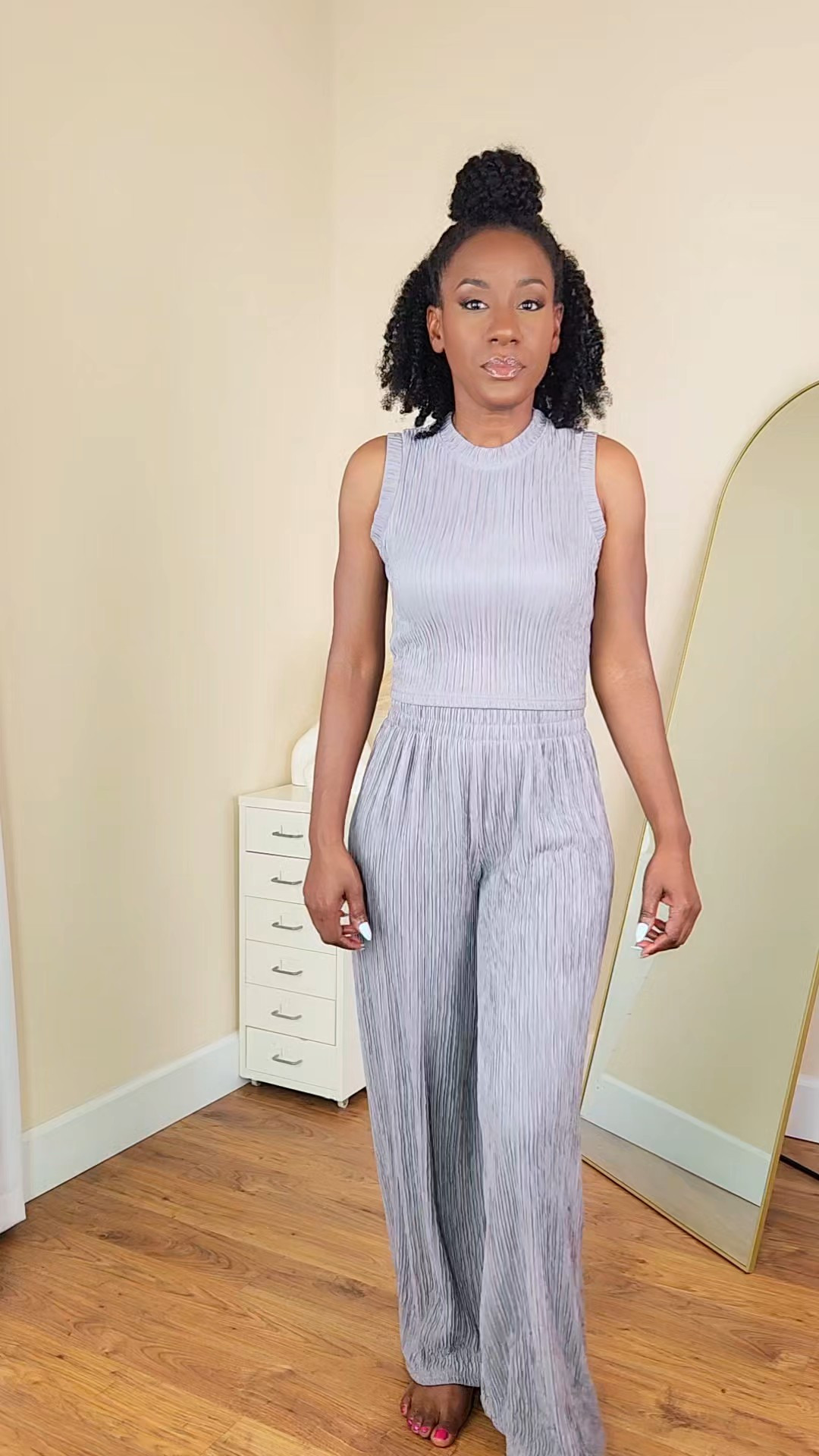 Today's ootd is a gray matching set that I got from Marshalls. I styled it with these black thong heels and my go-to everyday black Montana West bag. This sleeveless top and wide-leg pant set is lightweight, comfortable, and perfect for everyday wear, errands, or casual outings. #marshallsfinds

#LTKgrwm #LTKootd #LTKSeasonal