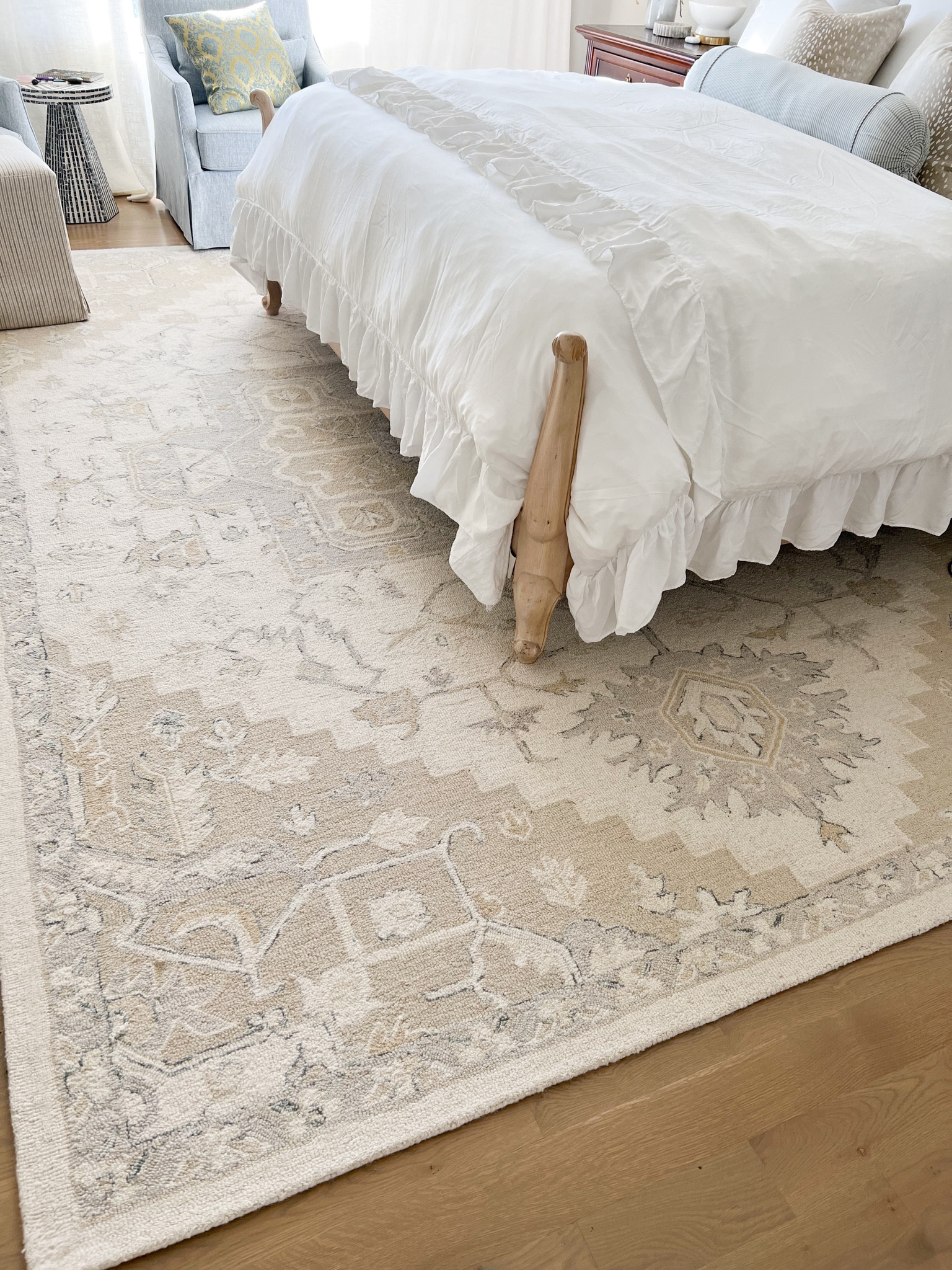My favorite neutral wool rug is on sale for way less than I bought it for a 9x12’! 

Coastal bedroom, medallion rug, ruffled duvet cover bedding. Blue upholstered swivel accent chairs  

#LTKhome #LTKsalealert