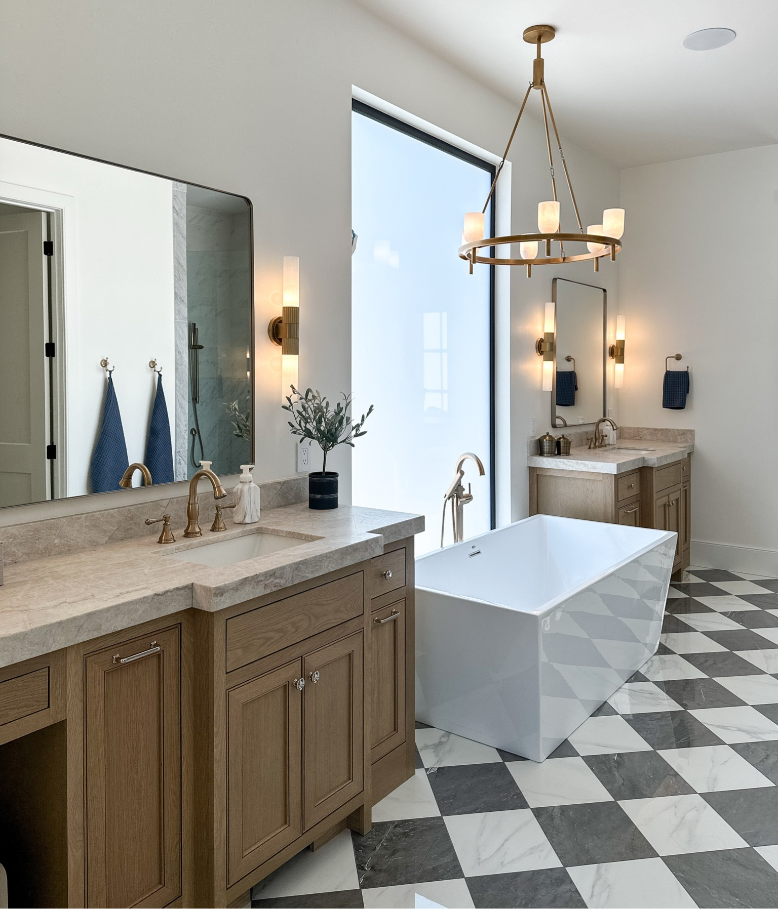 Primary bathroom links 
Counters: Taj Mahal Quartzite brushed. 
Paint: BM Swiss coffee
Vanity: white oak with custom stain (see @honeybuilthome cabinet highlight bubble for stain formula) 