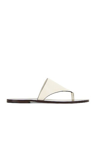 The Row Avery Thong Sandal in Cream | FWRD 