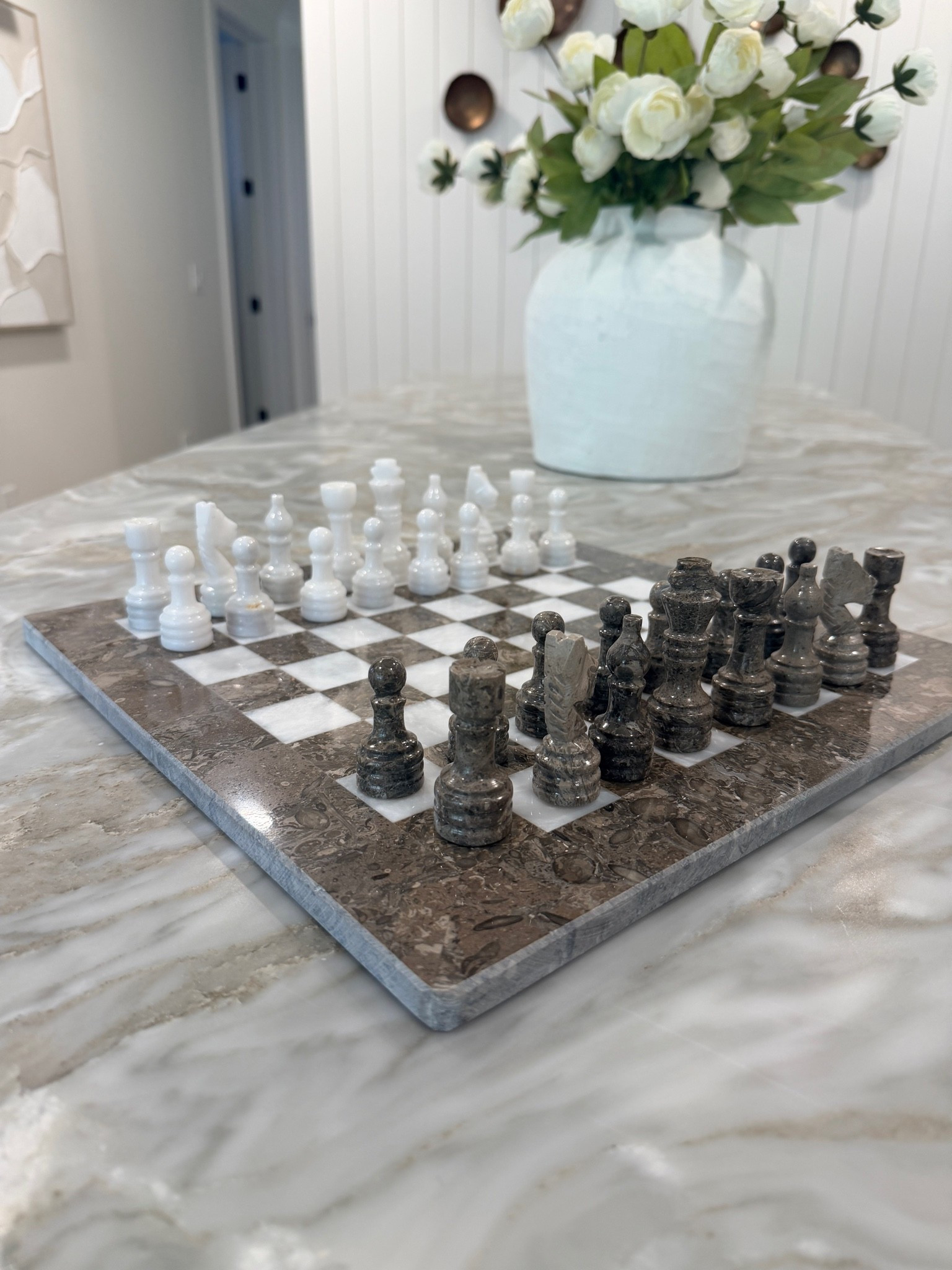 How pretty is this chess set?  Such a fun little styling piece + actually functional 🤎

#LTKHome #LTKSaleAlert