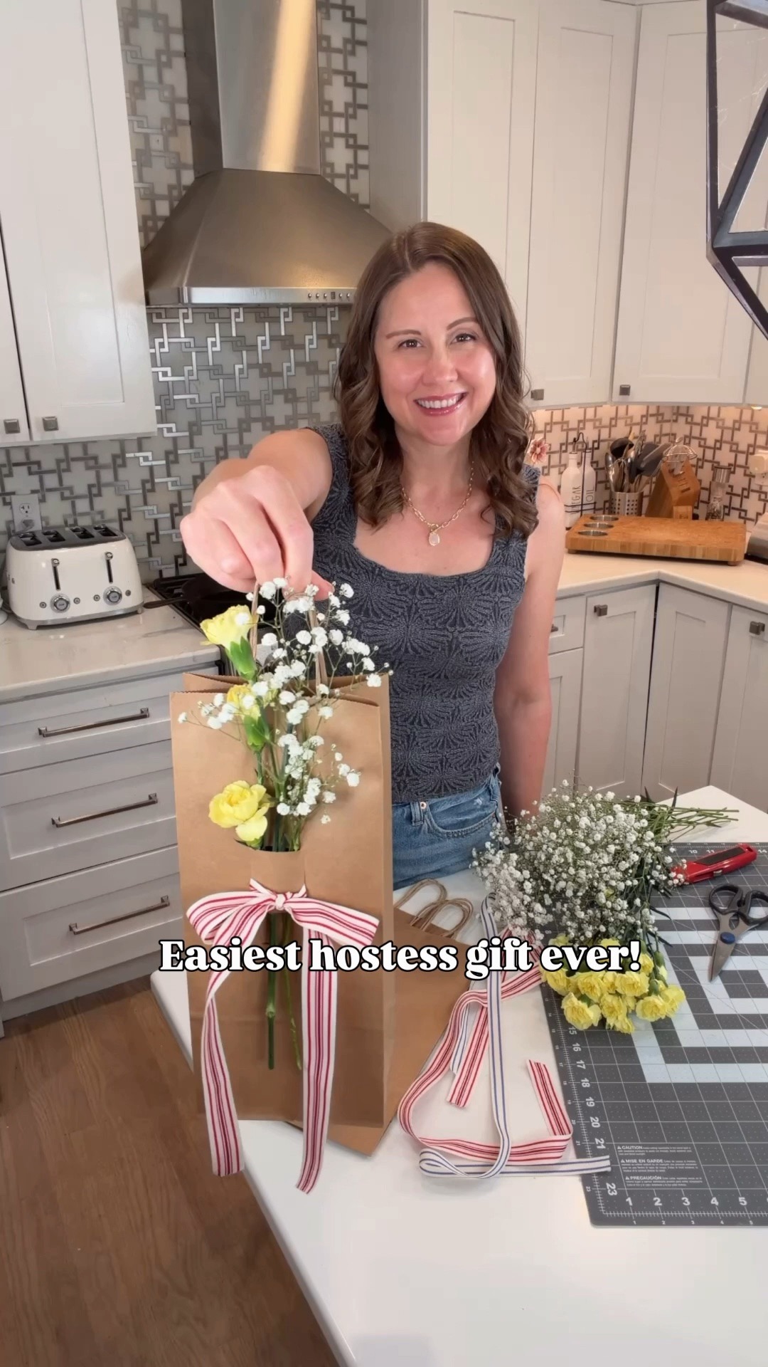 A hostess gift that feels extra special but takes just minutes to make! 🌸🍷

Grab a Kraft paper bag, cut a few small slits, and weave ribbon through the front to create the sweetest little bouquet holder. Add fresh flowers and a bottle of wine, and you’ve got the cutest gift that anyone would love to receive!

Simple, thoughtful, and such a fun way to dress up a bottle of wine. ✨

Save this idea for your next dinner party, girls’ night, or holiday gathering!#HostessGift #GiftIdeas #EntertainingIdeas #LTKHoliday

#LTKHome #LTKHome #LTKdayinmylife