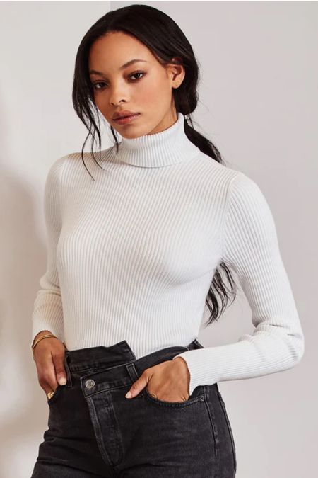 My absolute rubbed turtleneck sweater.  I wear this on repeat and it comes in the best colors.  Ticks in perfectly, not too thin, stretchy material, just awesome 

#LTKFind #LTKstyletip #LTKunder100