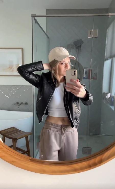 Love is… my new BLANKNYC Faux Leather bomber that I recently purchased from Nordstrom 😍 

What a beautiful jacket - it has removable hood for styling versatility. It feels so soft and very well made. Love the zip cuffs too. Great buy! I styled it with track pants and crop top. 




#LTKstyletip #LTKtravel #LTKunder100