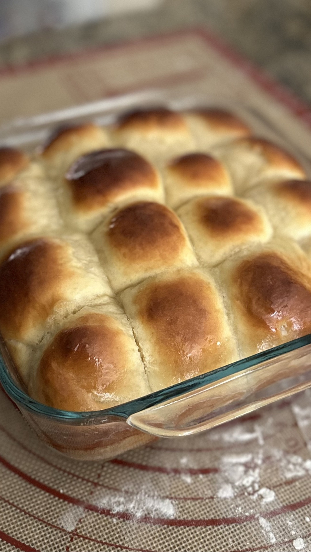 Hawaiian Rolls 

1/2 cup pineapple juice 
1/2 cup milk
1 tbsp yeast 

3 cups All Purpose flour 
1/4 cup sugar
1 1/4 tsp salt 

4 tbsp melted butter
2 tsp vanilla 
1 egg

Heat milk and pineapple juice to between 100-105 degrees. 

Add yeast.  Stir and set aside to activate.

In mixer, add flour, sugar, salt, butter, vanilla, and egg. 

Add your yeast and knead until well combined. 
*I usually knead on low for a couple minutes then bump it up one speed and knead for about 5-7 minutes. 
*If your dough is too wet, you can add flour a bit at a time until your dough is sticky and pulling away from the sides of the bowl. 

Transfer your dough to an oiled bowl.  Cover and let rise for 1-2 hours.
*For cold fermentation, cover and place in the fridge for at least 4 and up to 8 hours. If you do cold fermentation, make sure to let you dough come to room temp before moving on.

Punch the dough down to deflate and turn it out onto a lightly floured surface. 

Divide the dough into 16 sections. 
*I divided the dough in half and work with one half at a time.

Form your dough by pressing each section out flat, fold it in thirds like a letter, and roll it up.  Create a “C” shape with you hand and roll the dough on the mat until you form a smooth ball. 

Place the bowl in a buttered baking dish, and repeat with all the other sections. 
*I used a 8x8 dish.

Let the dough rest for about 30 minutes and preheat your oven to 375 degrees. 

Brush with an egg wash and bake for about 20-25 minutes or until golden brown.

Brush with some melted butter (about 1 tbsp) and enjoy!  They are best served warm.

#LTKmomlife #LTKfoodie #LTKHome