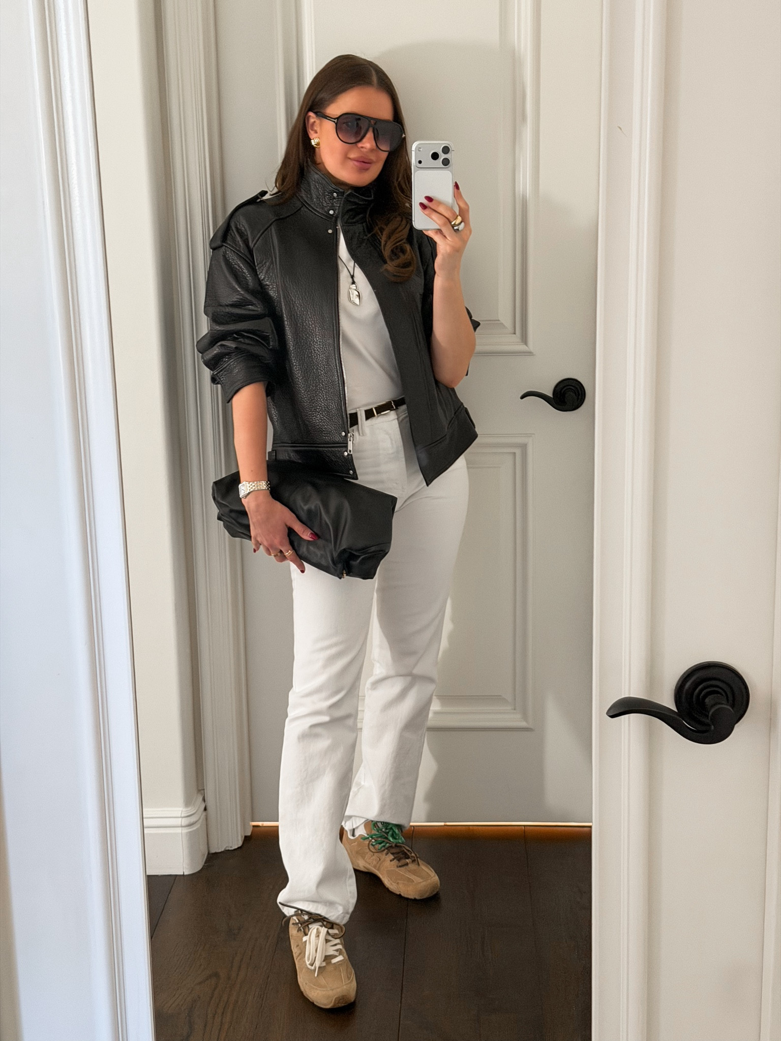 Styling this @Zara black leather bomber jacket with white denim and brown suede sneakers. Jeans are running small. Size up for the best fit! (Wearing size 6 Zara jeans and size XS jacket) 
#sneakers #suede #brown #black #leather #bomber #jacket #miumiu #newbalance #revolve #zara #straightleg #jeans #aviators #LTKCyberWeek#LTKFindsUnder50 #LTKFindsUnder100

#LTKSeasonal #LTKSaleAlert #LTKootd #LTKgrwm #LTKWorkwear