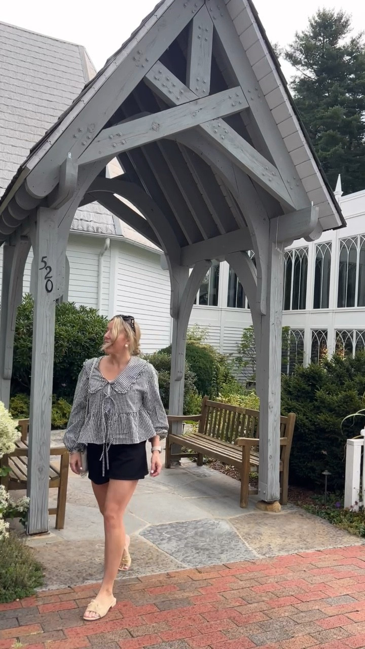 Anthropologie look for less! Summer to fall top for only $23! Pair this too with jeans and sneakers for cooler weather. Love the peplum babydoll fit, the ruffle Peter Pan collar, and the bow ties on the front. Wearing a medium and it’s TTS, meant to be roomy. 

Shorts are a staple I love so much that I have in white also! I wear these slides with everything also!

#LTKFindsUnder50 #LTKVideo #LTKFallSale