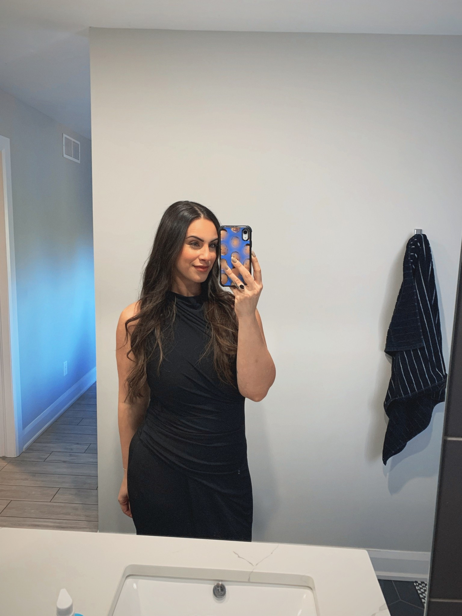 I am OBSESSED with this dress!! Hugs the body so beautifully! I’m wearing a Large 