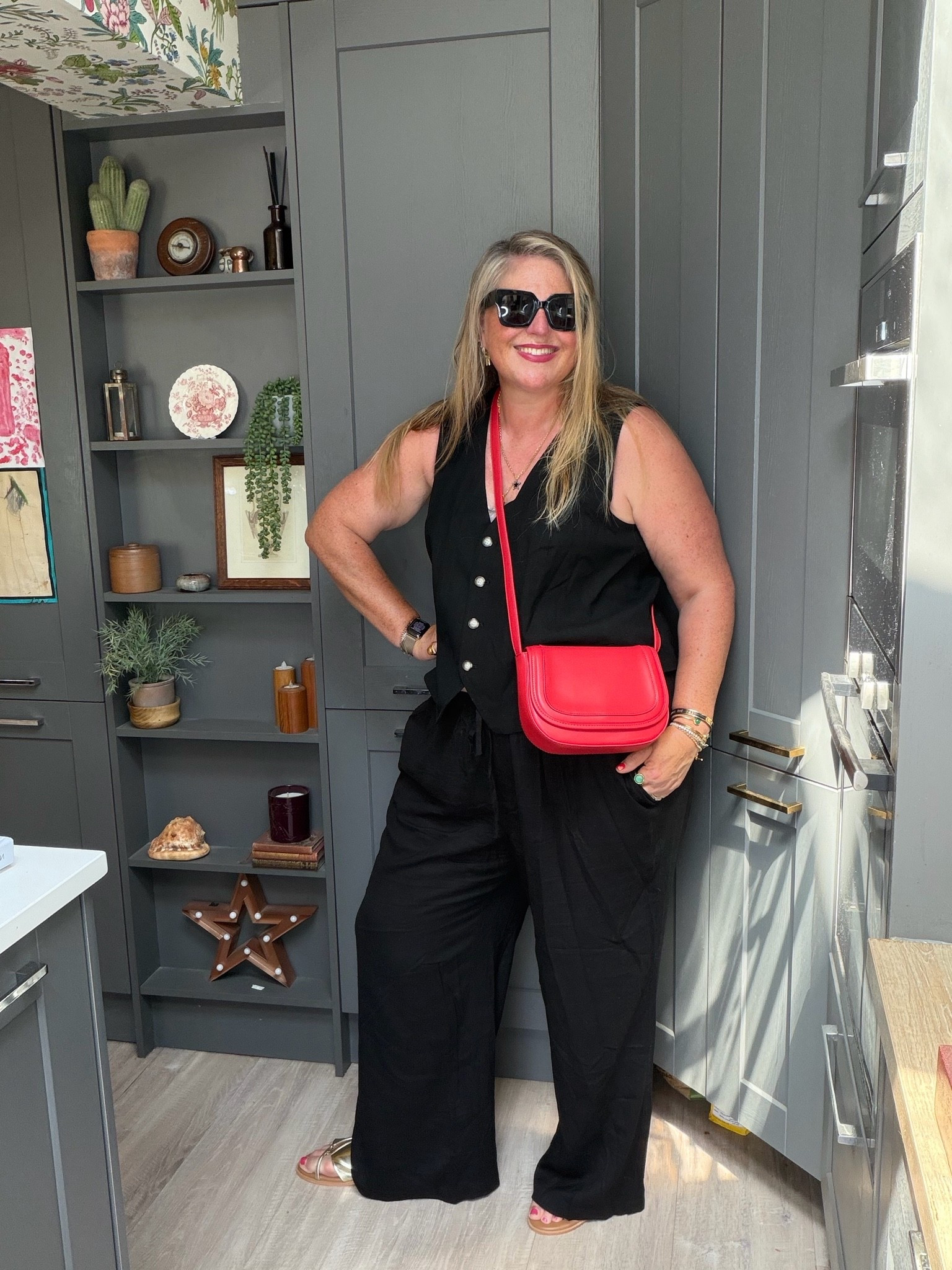 Black waistcoat, linen trousers, gold sandals, red bag, black sunglasses

#LTKsummer #LTKplussize #LTKspring