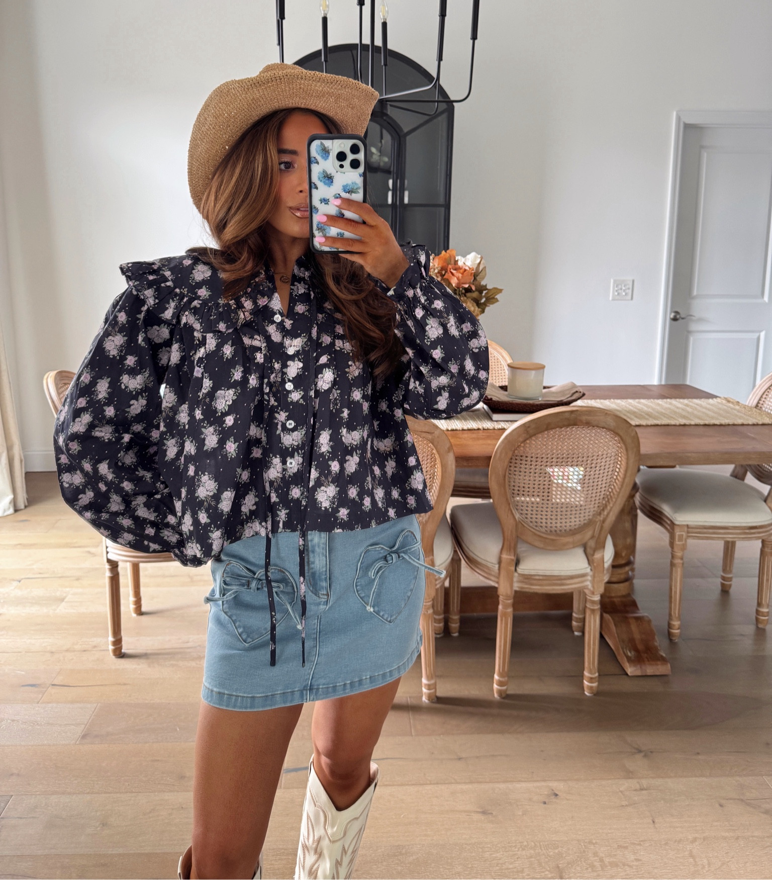 Floral vibes and heart-filled style 💐❤️ Rocking a loose floral top with a heart-detailed jean skirt and cowboy boots — ready to steal the show at the concert! 🤠🎤 

#LTKBeauty #LTKSeasonal #LTKStyleTip