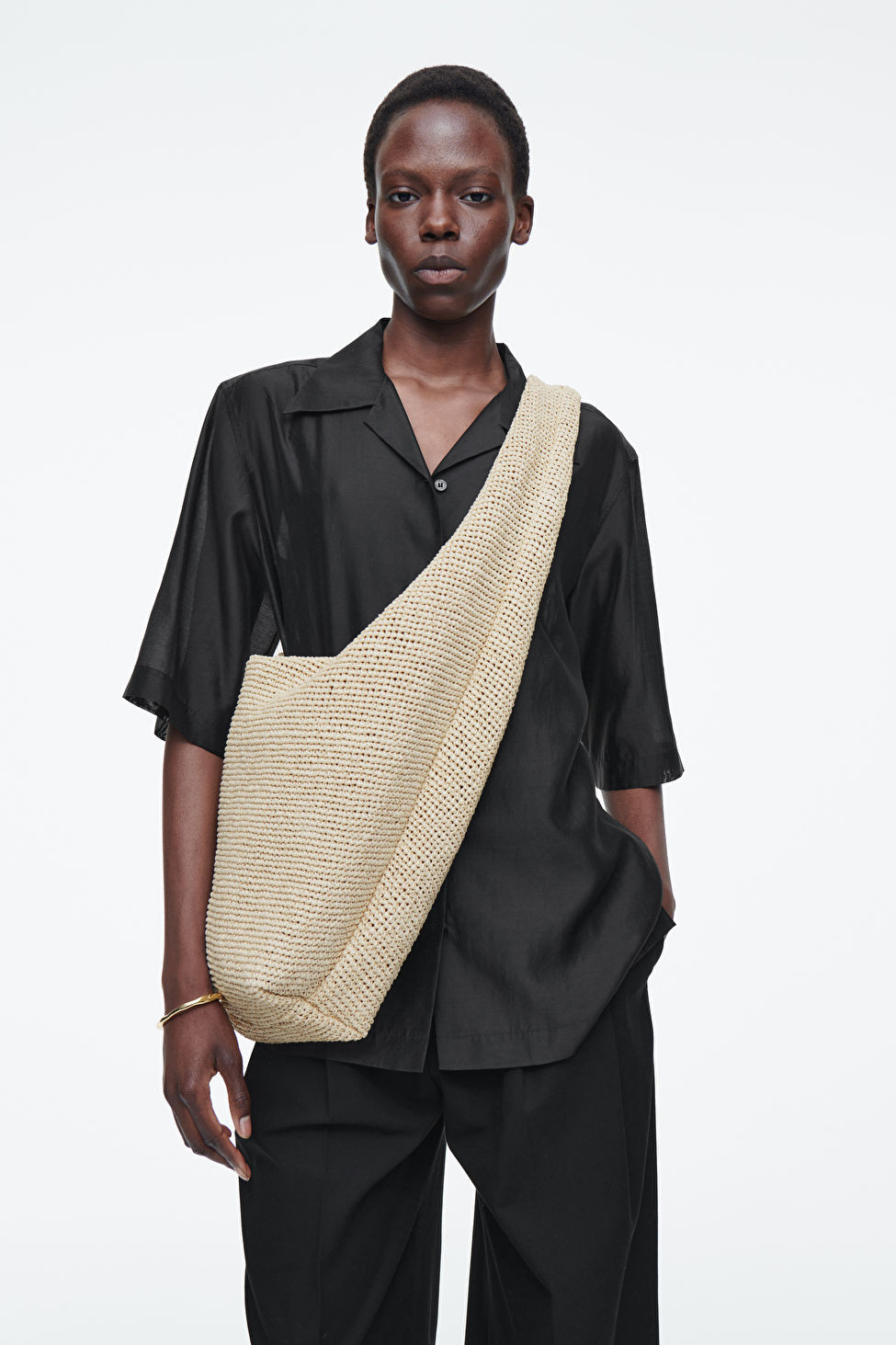 OVERSIZED SLING BAG - RAFFIA | COS UK