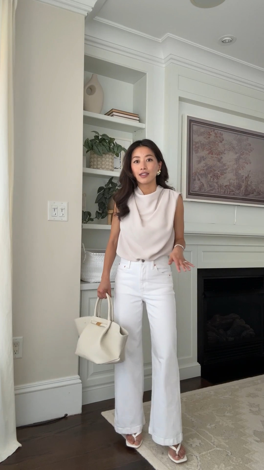 Sizing below! Simple elevated outfit with good white jeans  
• Aritzia Carter Satin Blouse xxs - runs big and longer. drapes nicely so tucks in easily. Elevated and machine washable.
• Gap high rise stride wide leg ankle jeans in 24 regular in white. 
L
I got regular instead of petite so that I can wear these as a full length with flats and sneakers.
• Demellier midi NY bag

• Heaven Mayhem mini knot earrings

Drape blouse, workwear, petite style

#LTKPetite #LTKootd #LTKWorkwear