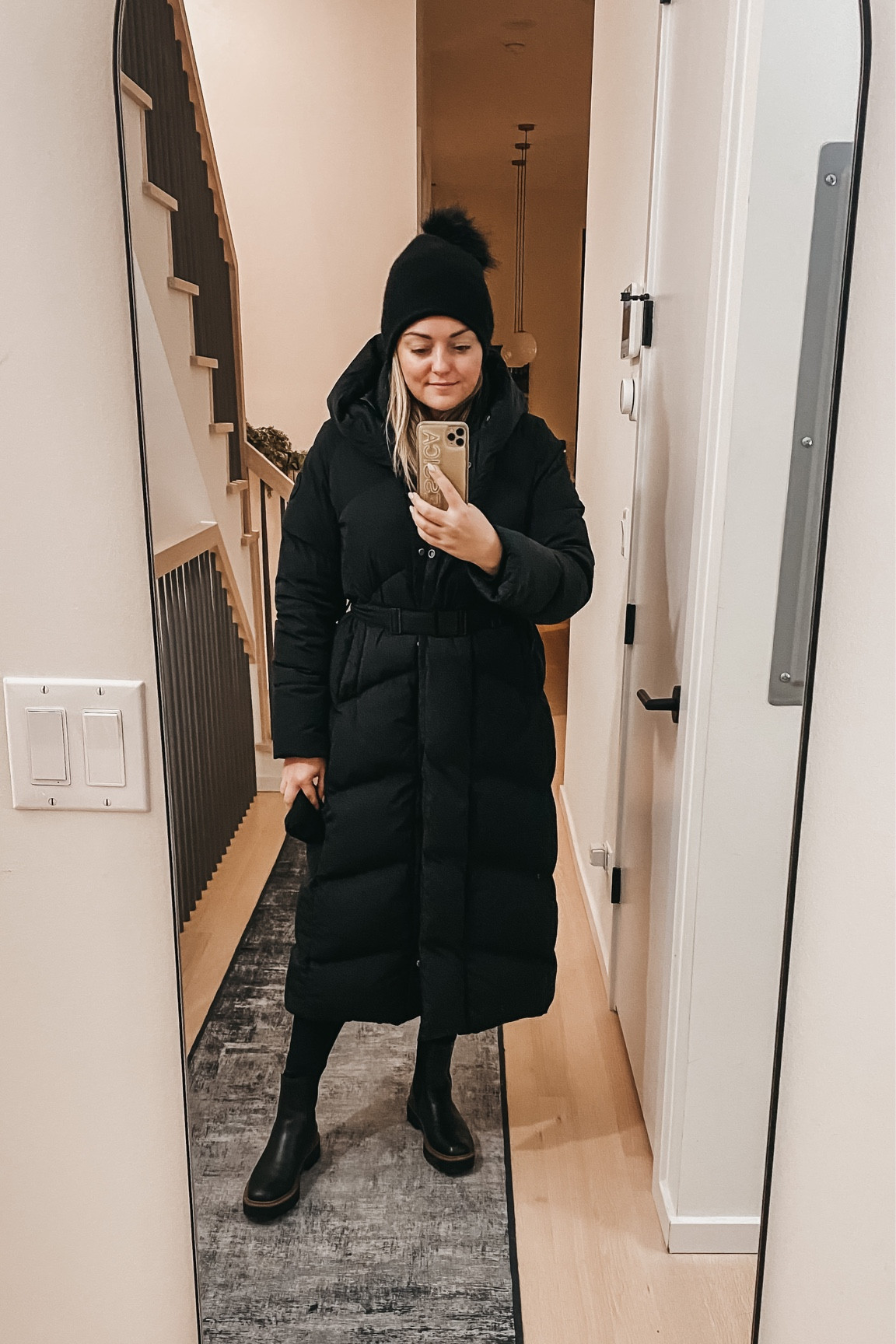 Long down belted parka. Waterproof lugsole boots. Amazon leggings. Cashmere beanie.

#LTKstyletip #LTKSeasonal #LTKshoecrush