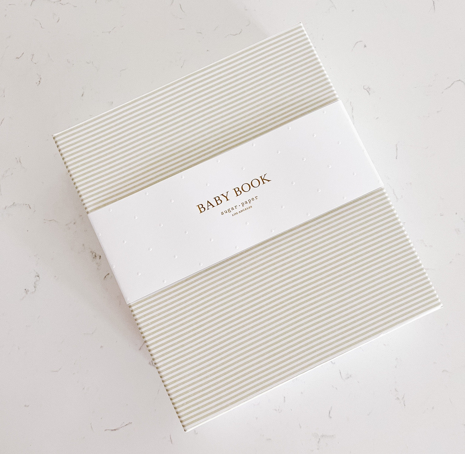 The baby book of my dreams 😍 There are pockets for letters to your sweet baby, photos, places for you to tell stories, etc. so well made and would make the PERFECT gift for an expecting mother in your life also. Comes in other cover colors.

#nuserygift #babyshower #maternity #pregnancy #giftidea #babybook #keepsake #gift #book #bumpfriendly #pregnant #baby #sugarpaper #stationery #paper 

#LTKbaby #LTKGiftGuide #LTKHoliday