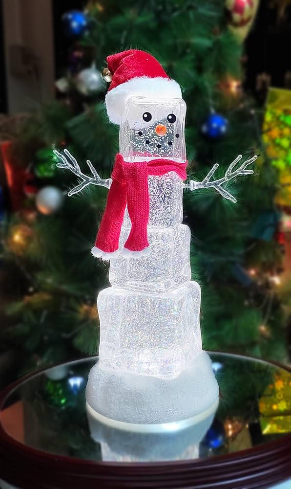 MOMENTS IN TIME 13.5“H Acrylic Ice Cube Snowman - LED Lights, Water Spinning Glitter, Battery O... | Amazon (US)