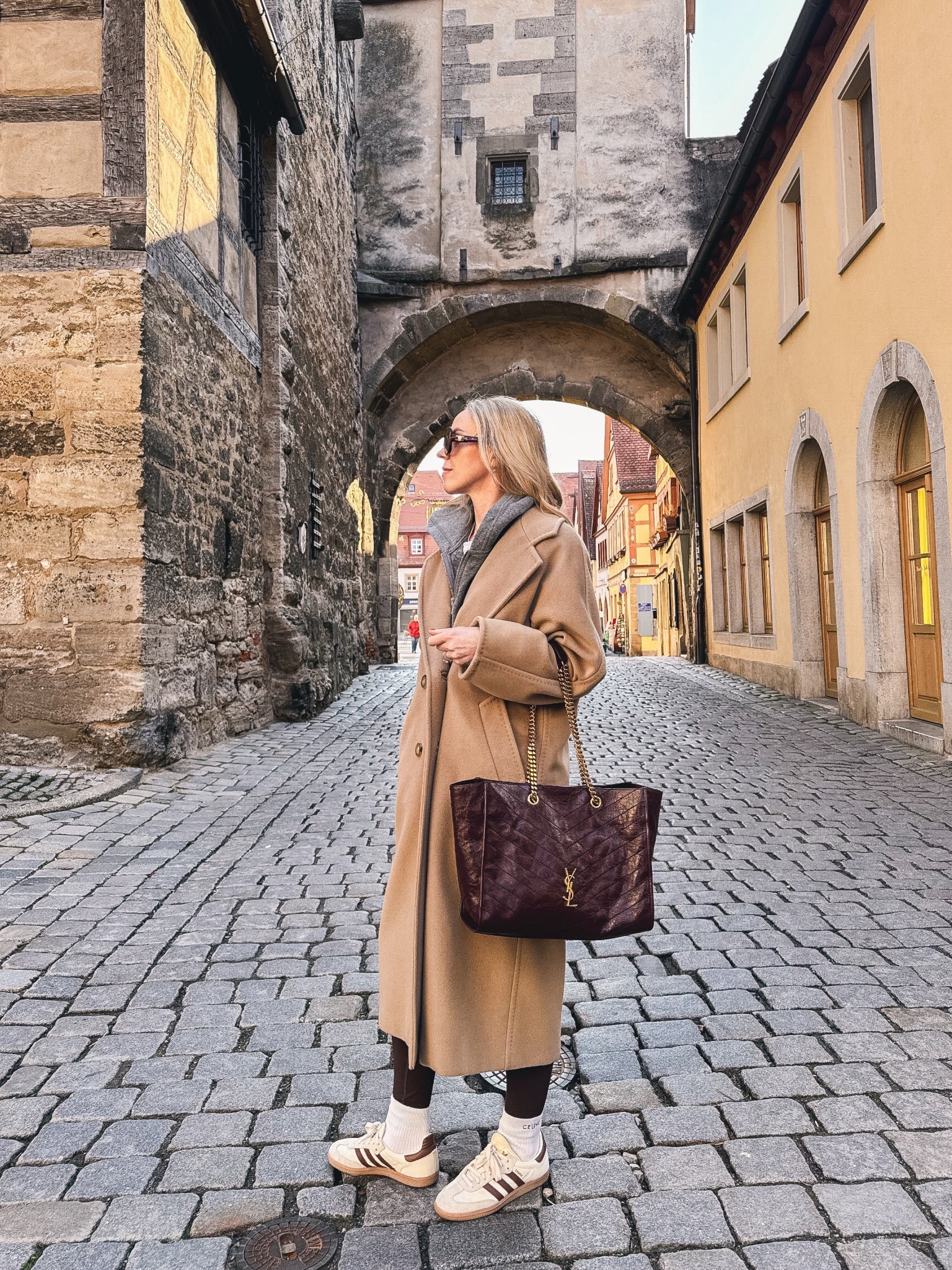 Travel look, European vacation, camel coat, chocolate brown leggings, Adidas Samba sneakers, burgundy YSL tote bag

#LTKSeasonal #LTKOver40 #LTKTravel