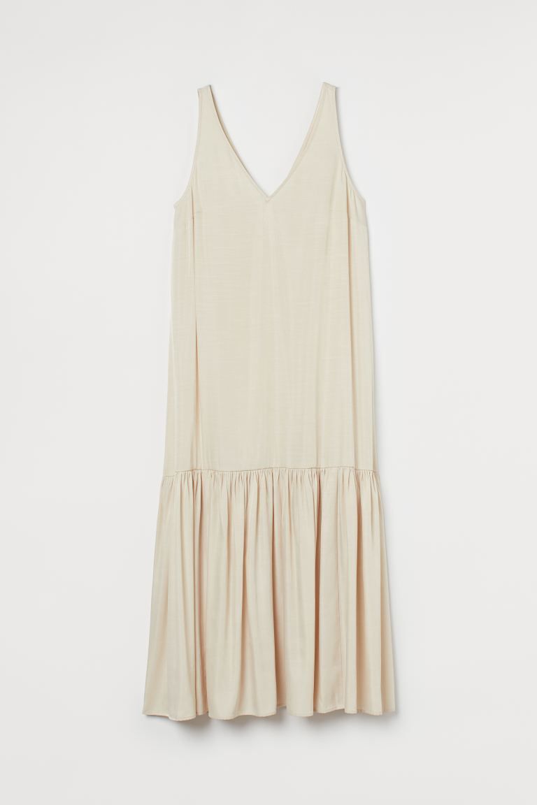 Sleeveless, calf-length, relaxed-fit dress in woven fabric. Low-cut V-neck at front and back. Gat... | H&M (US + CA)