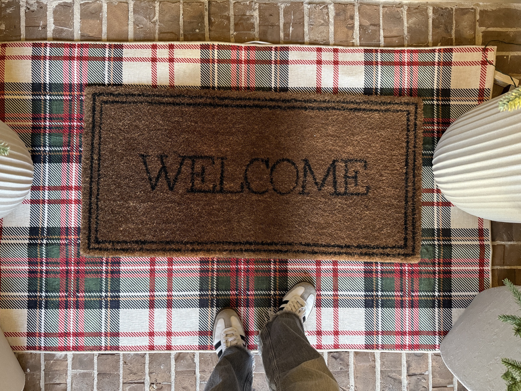 The easiest way to make your porch feel festive: start from the ground up! A plaid rug layered under a welcome doormat instantly adds warmth and holiday charm ✨ Christmas porch decor, front porch Christmas ideas, outdoor holiday decorations, pre-lit trees, Christmas wreath styling, neutral Christmas decor, cozy front door decor, beige white gray entertaining

#LTKHoliday #LTKHome #LTKSeasonal