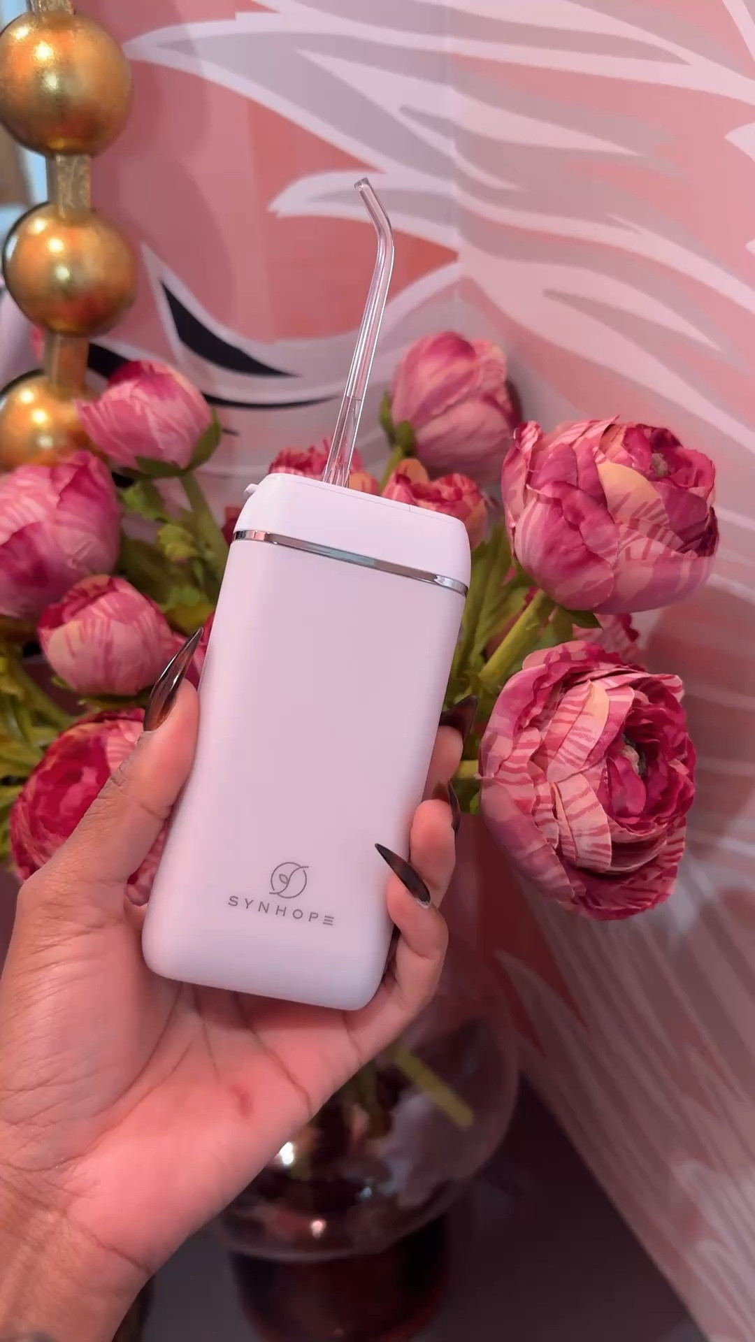 Travel size water flosser 

#LTKselfcare #LTKmorningroutine #LTKBeauty