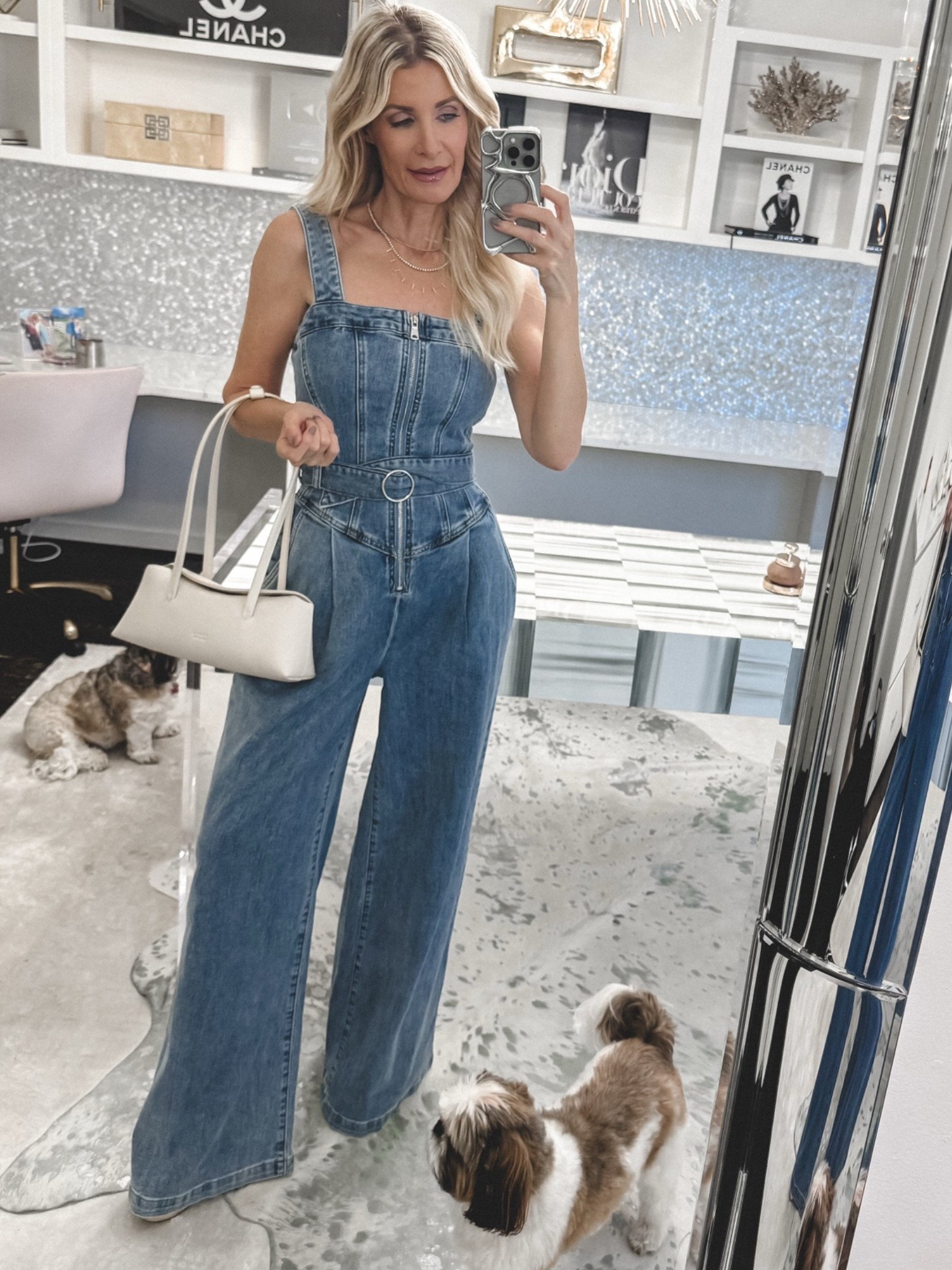 The perfect summer denim jumpsuit — chic, flattering, and so easy to wear ✨ Love the bustier-style top, cinched waist, and wide leg silhouette for brunch, date night, or girls night out. Wearing an XS. #DenimJumpsuit #SummerStyle 
 

 

#LTKootd #LTKOver40 #LTKSeasonal