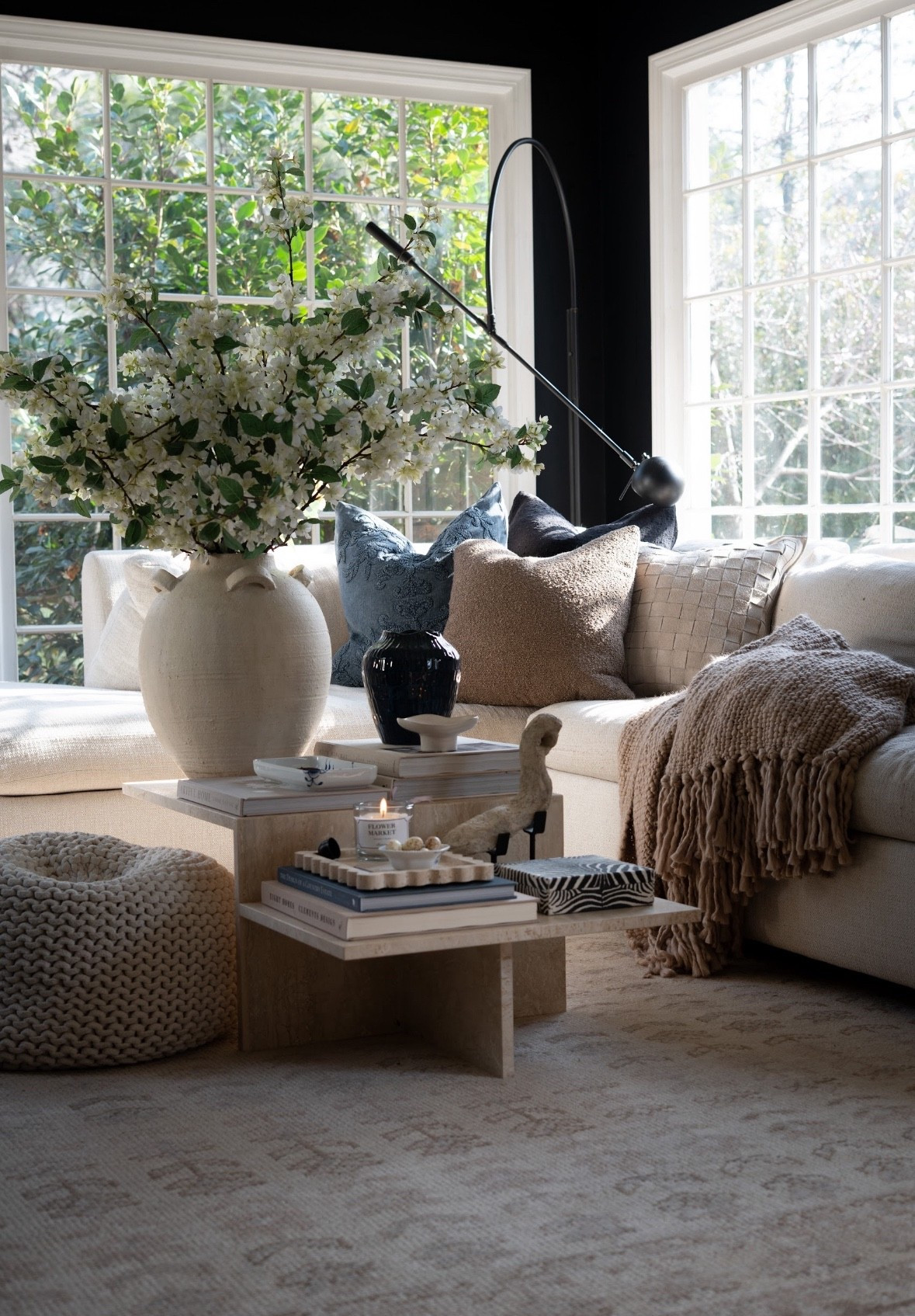 You guys I am actually obsessed with this corner. The fresh spring branches, neutral living room decor, stacked design books, and cozy textures on this marble coffee table are everything. Add the sunshine streaming through the windows and it feels like the most peaceful, beautiful spring moment.

#LTKHome #LTKSpringSale #LTKSeasonal