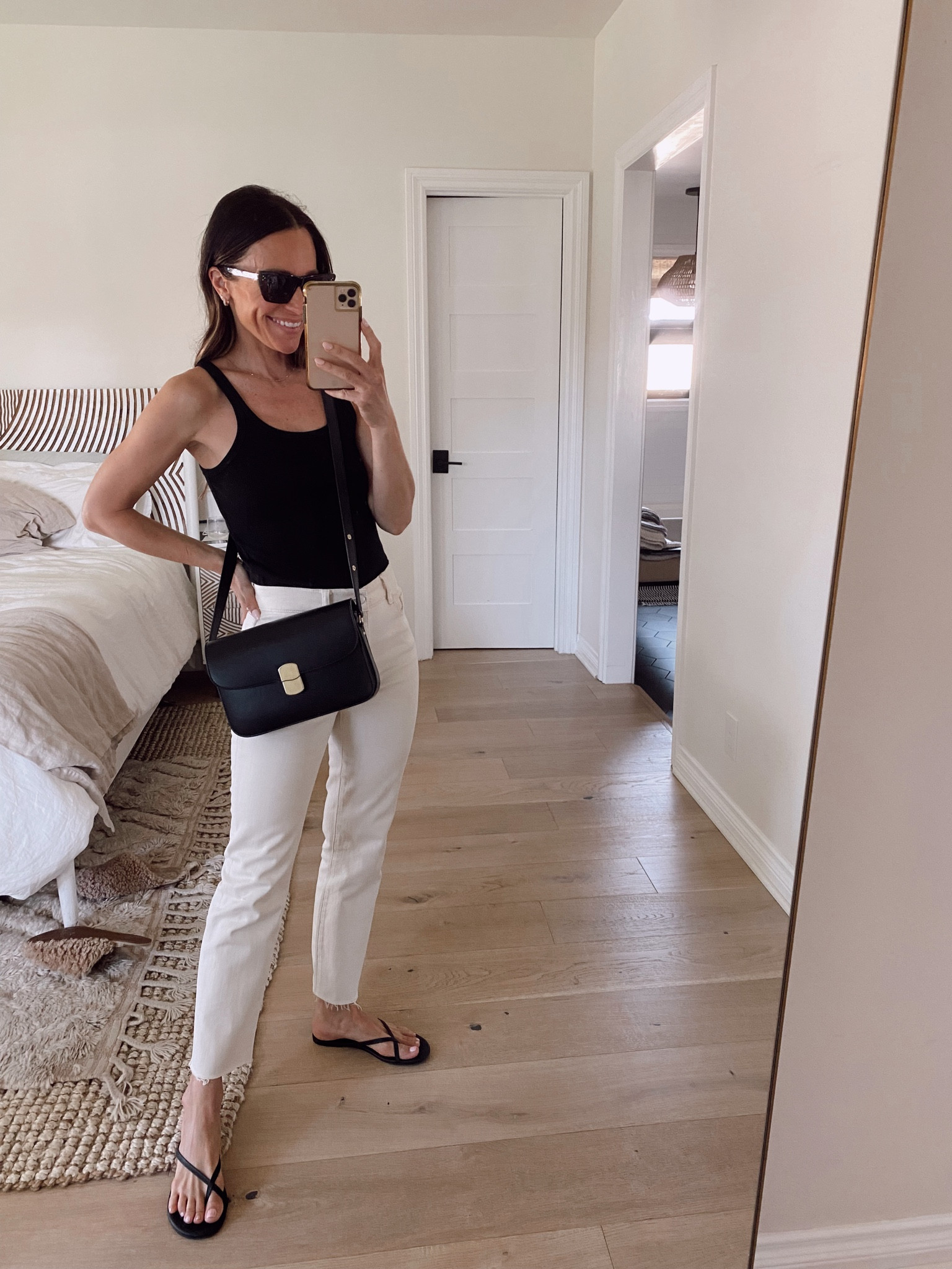 Today’s outfit from April’s capsule wardrobe 
Black ribbed tank- runs tts 
Cream denim- went up one size and had to cut the hem by about an inch 
I’m a 6.5 in shoes and purchased the 7 